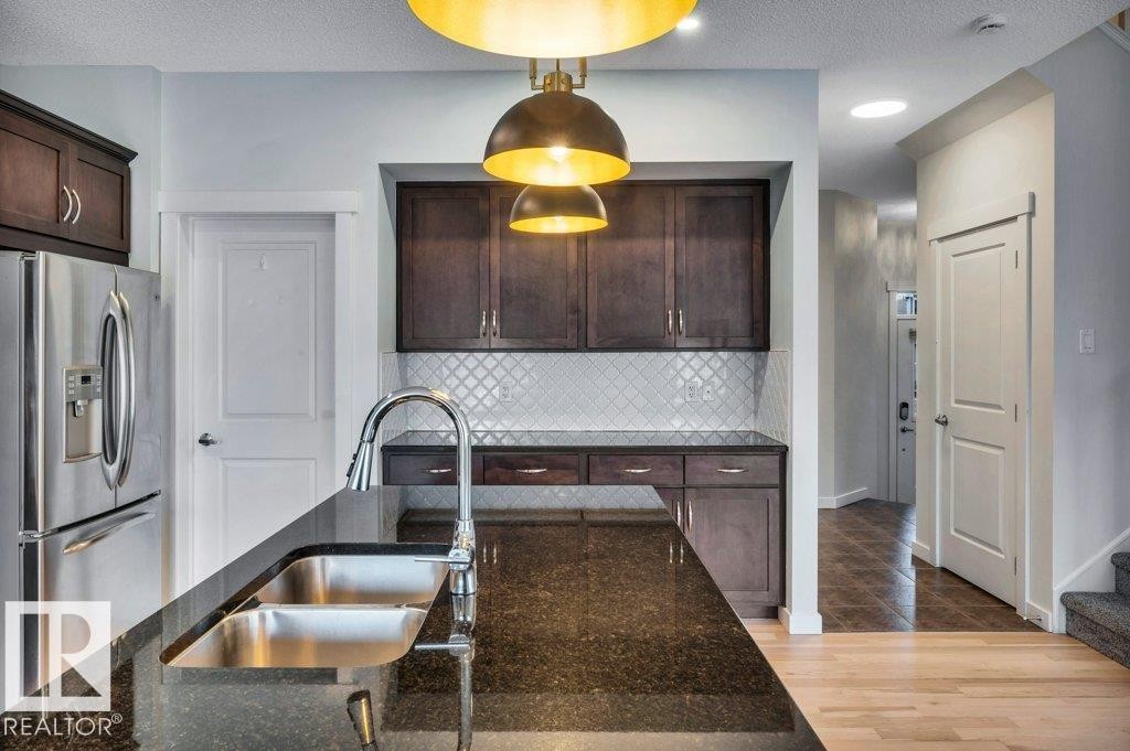 237 Sheppard Circle, Leduc, AB - Indoor Photo Showing Kitchen With Double Sink