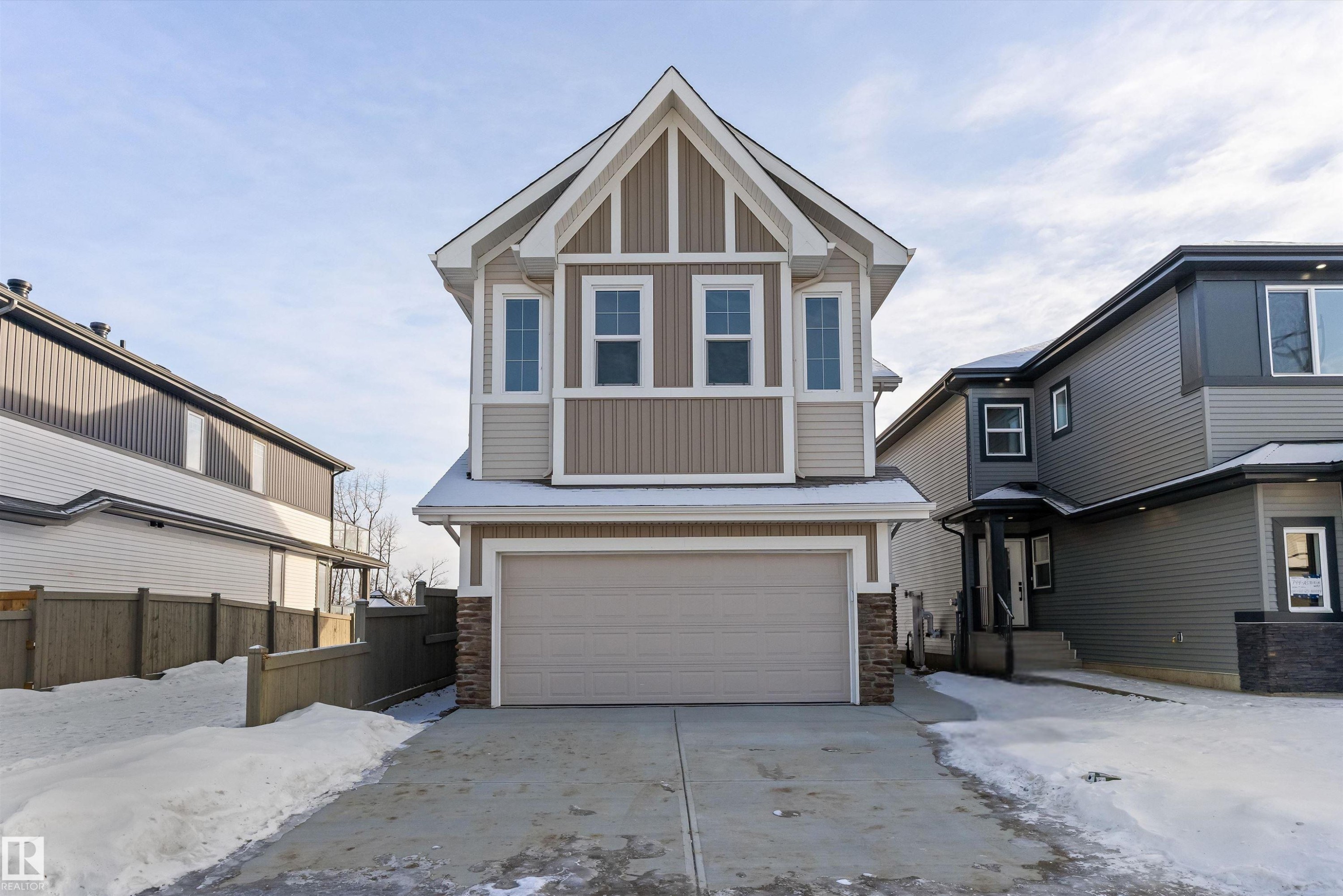 740 Astoria Way, Devon, AB - Outdoor With Facade