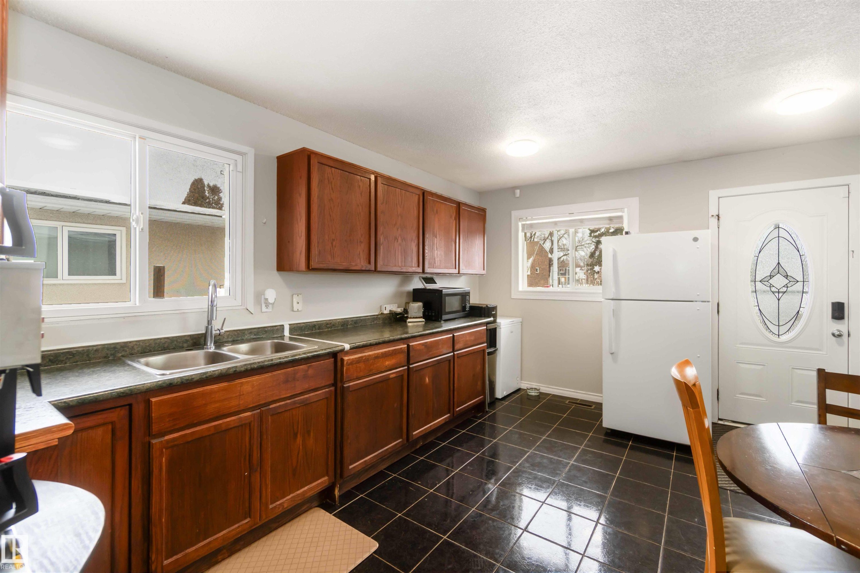 11306 32 Street, Edmonton, AB - Indoor Photo Showing Kitchen With Double Sink