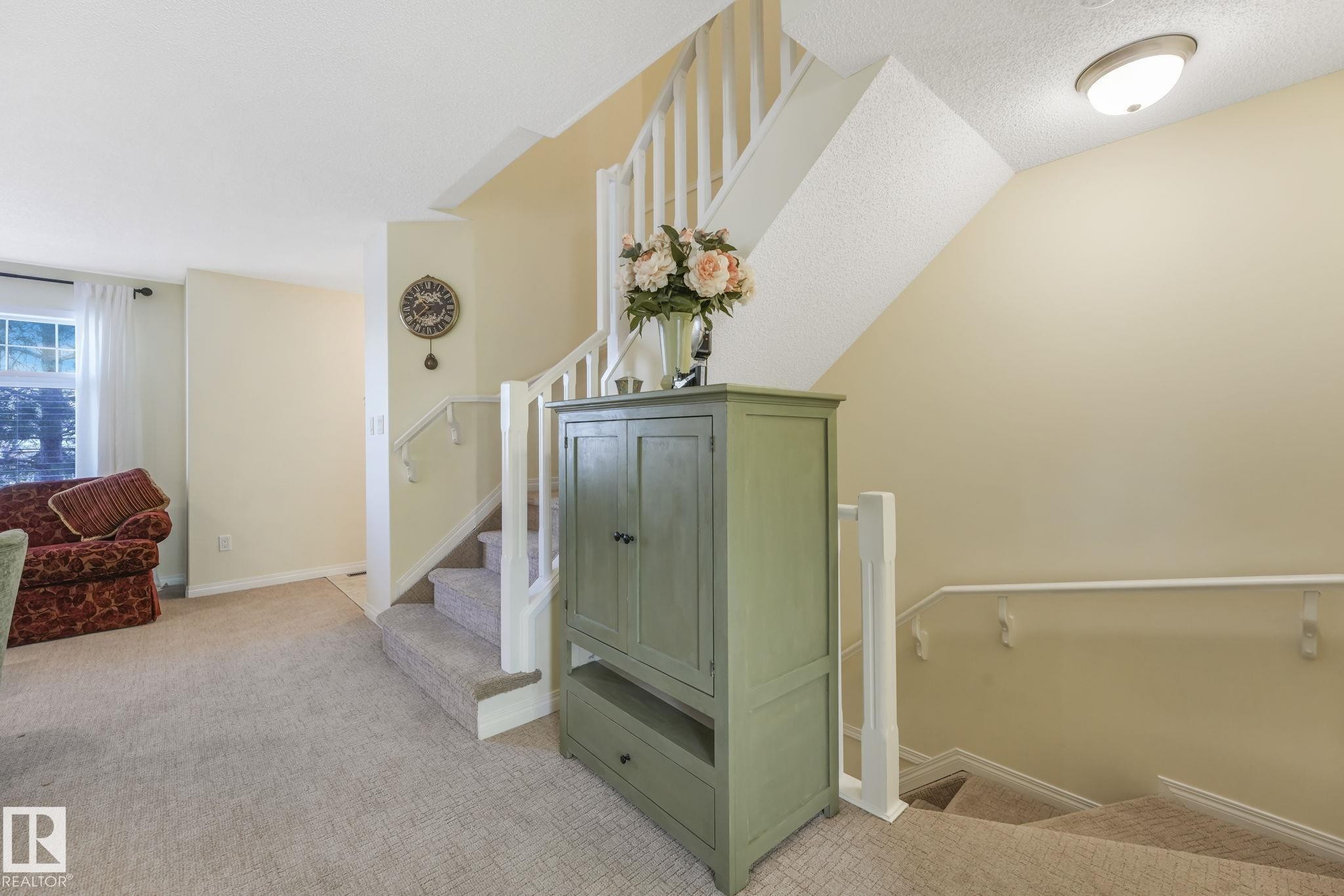 Stairs featuring carpet - 23 4755 Terwillegar Common, Edmonton, AB - Indoor