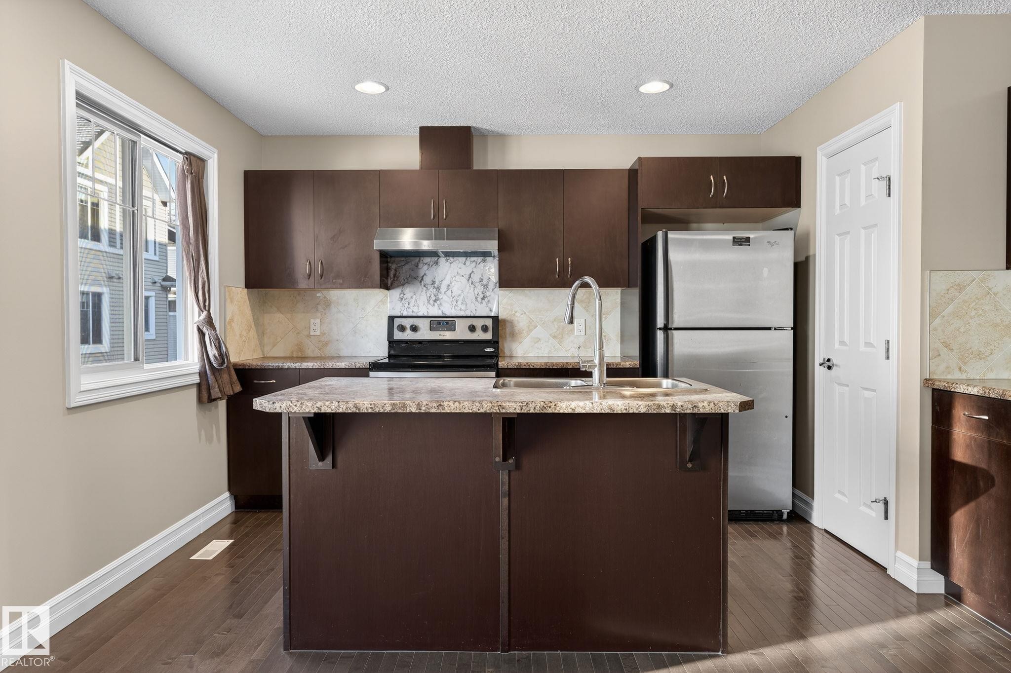 Edmonton, AB - Indoor Photo Showing Kitchen With Double Sink