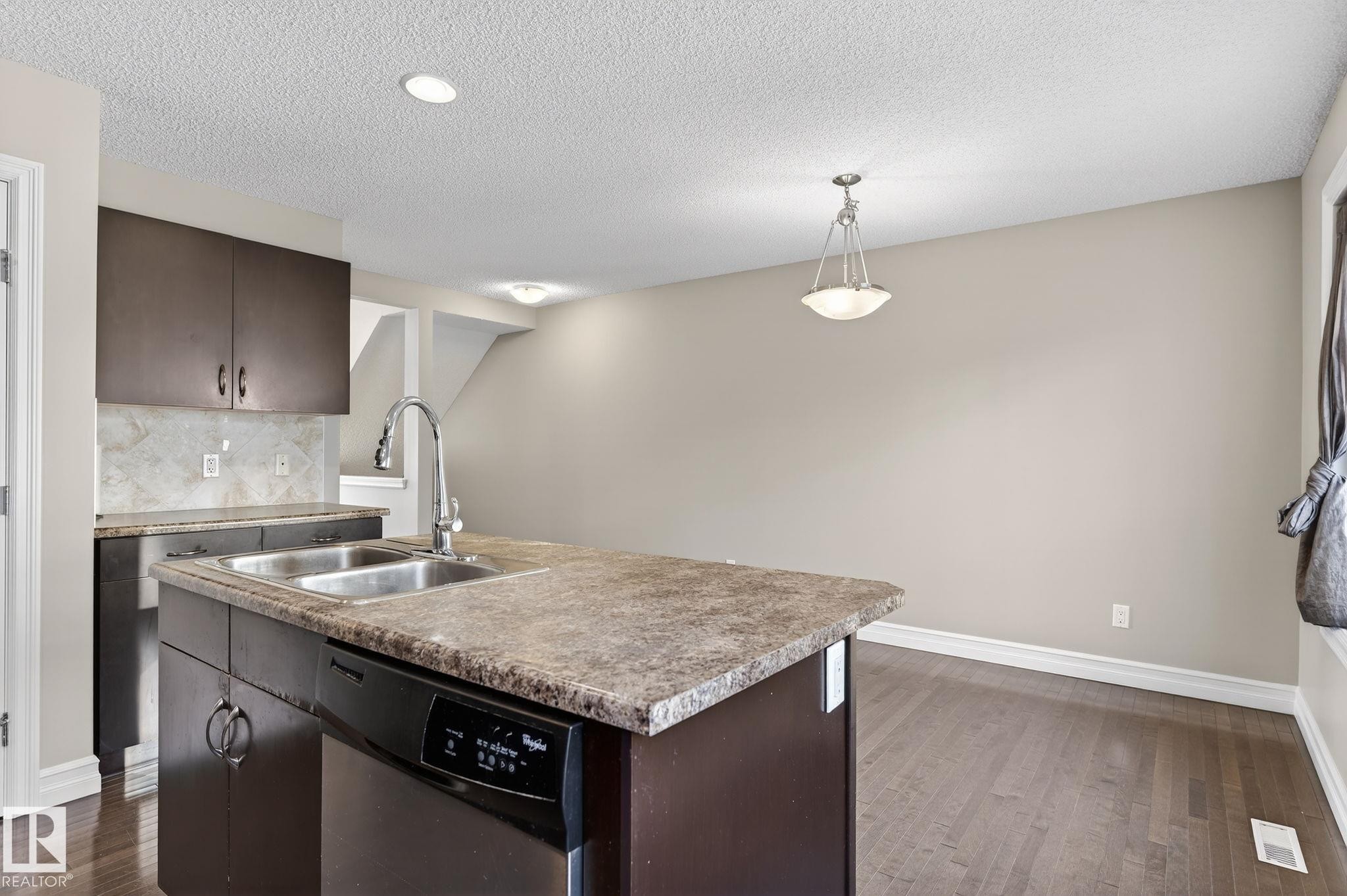 Edmonton, AB - Indoor Photo Showing Kitchen With Double Sink