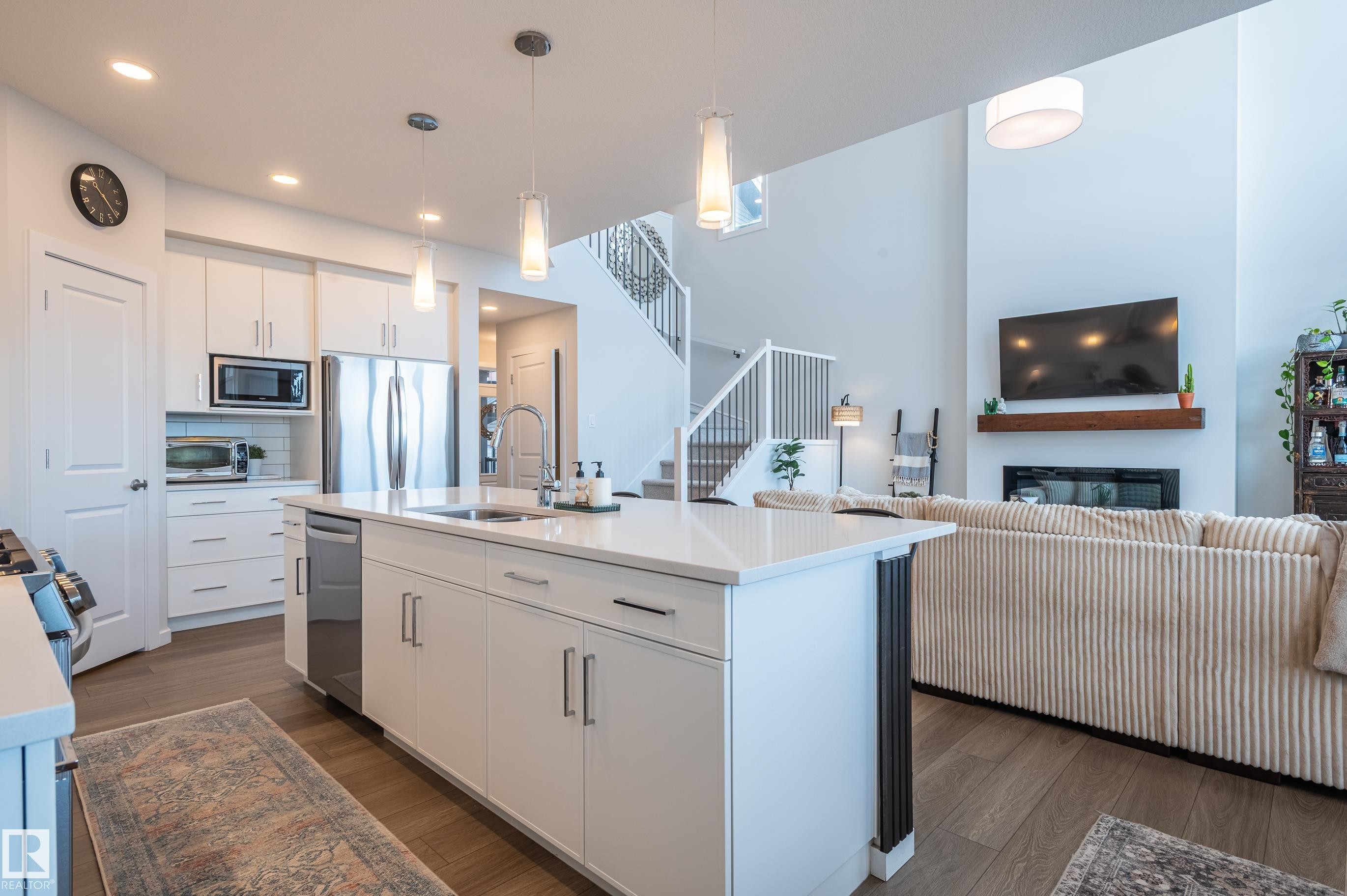 37 Rhea Crescent, St. Albert, AB - Indoor Photo Showing Kitchen With Fireplace With Upgraded Kitchen