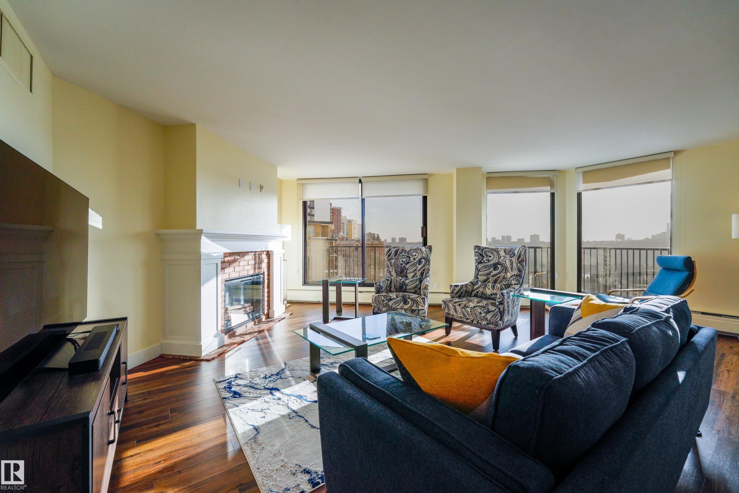 602 11710 100 Avenue, Edmonton, AB - Indoor Photo Showing Living Room With Fireplace