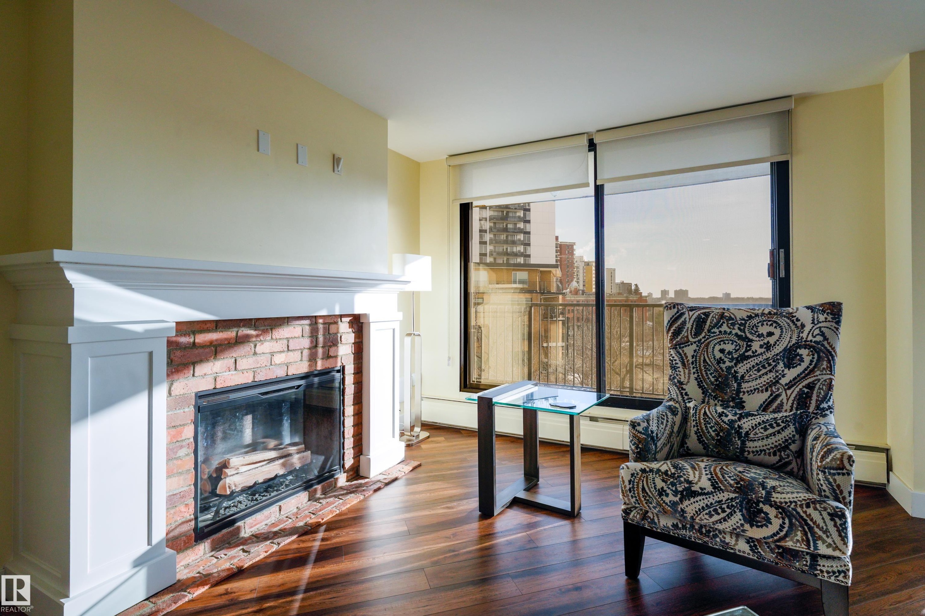 602 11710 100 Avenue, Edmonton, AB - Indoor Photo Showing Living Room With Fireplace