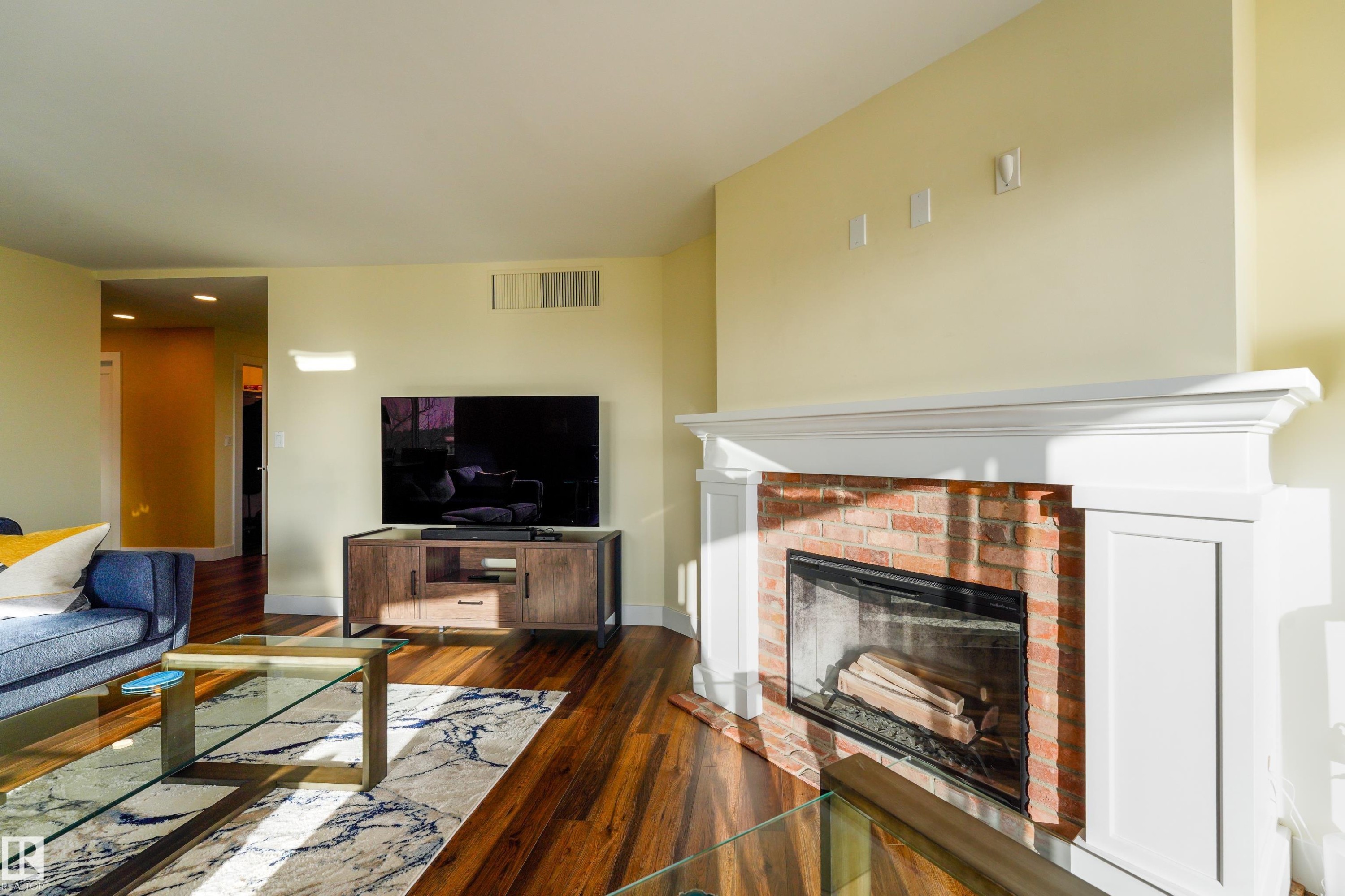 602 11710 100 Avenue, Edmonton, AB - Indoor Photo Showing Living Room With Fireplace