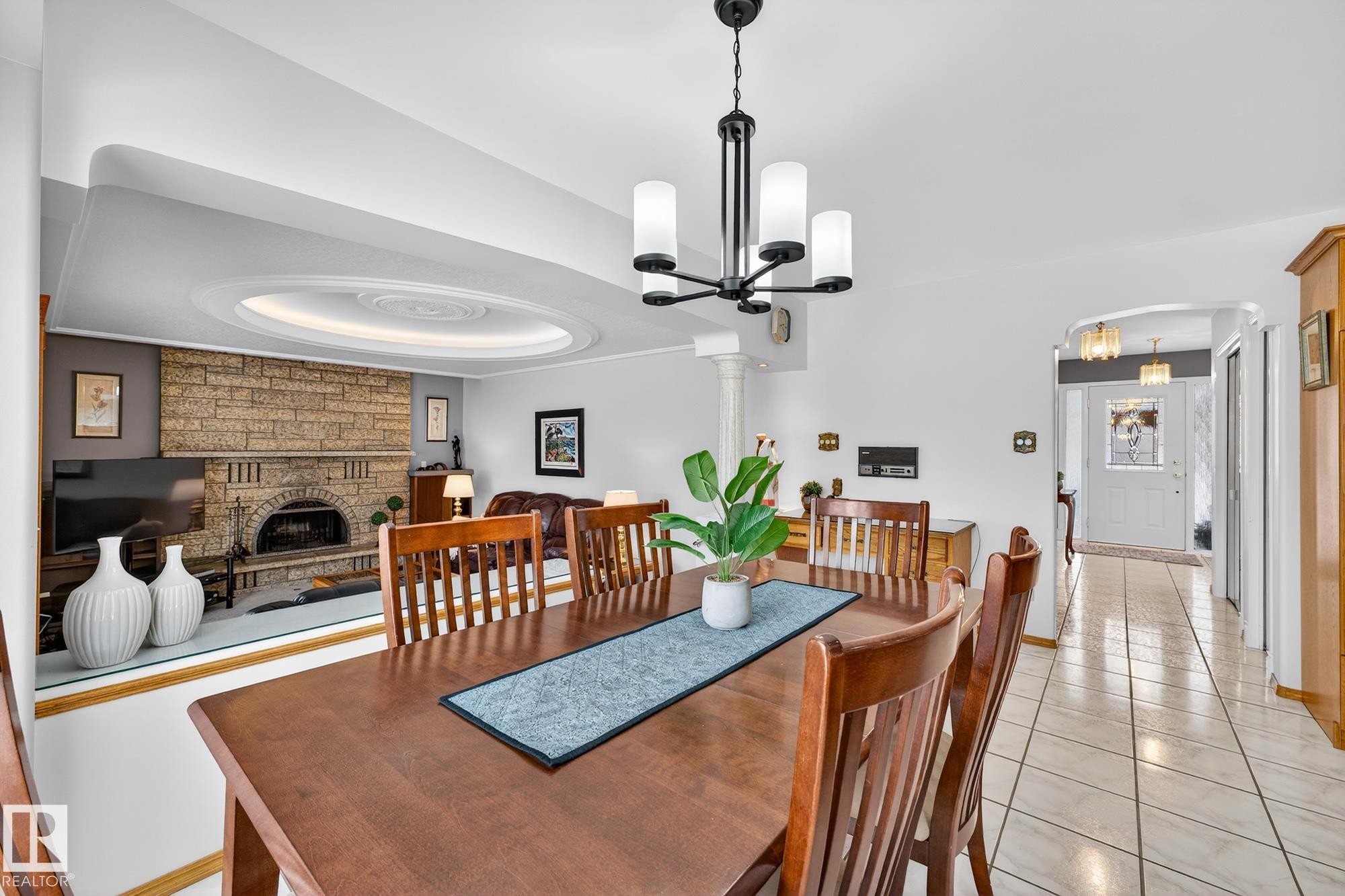 3455 Hill View Crescent, Edmonton, AB - Indoor Photo Showing Dining Room With Fireplace