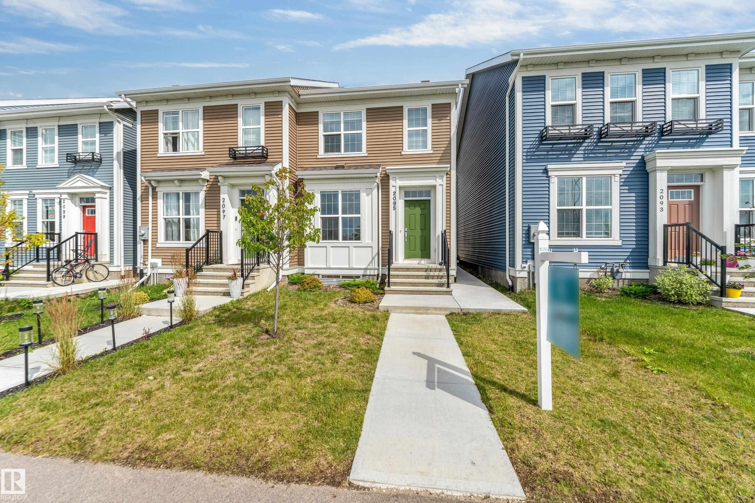 View of front of house featuring a front yard - 2095 Maple Road, Edmonton, AB - Outdoor With Facade