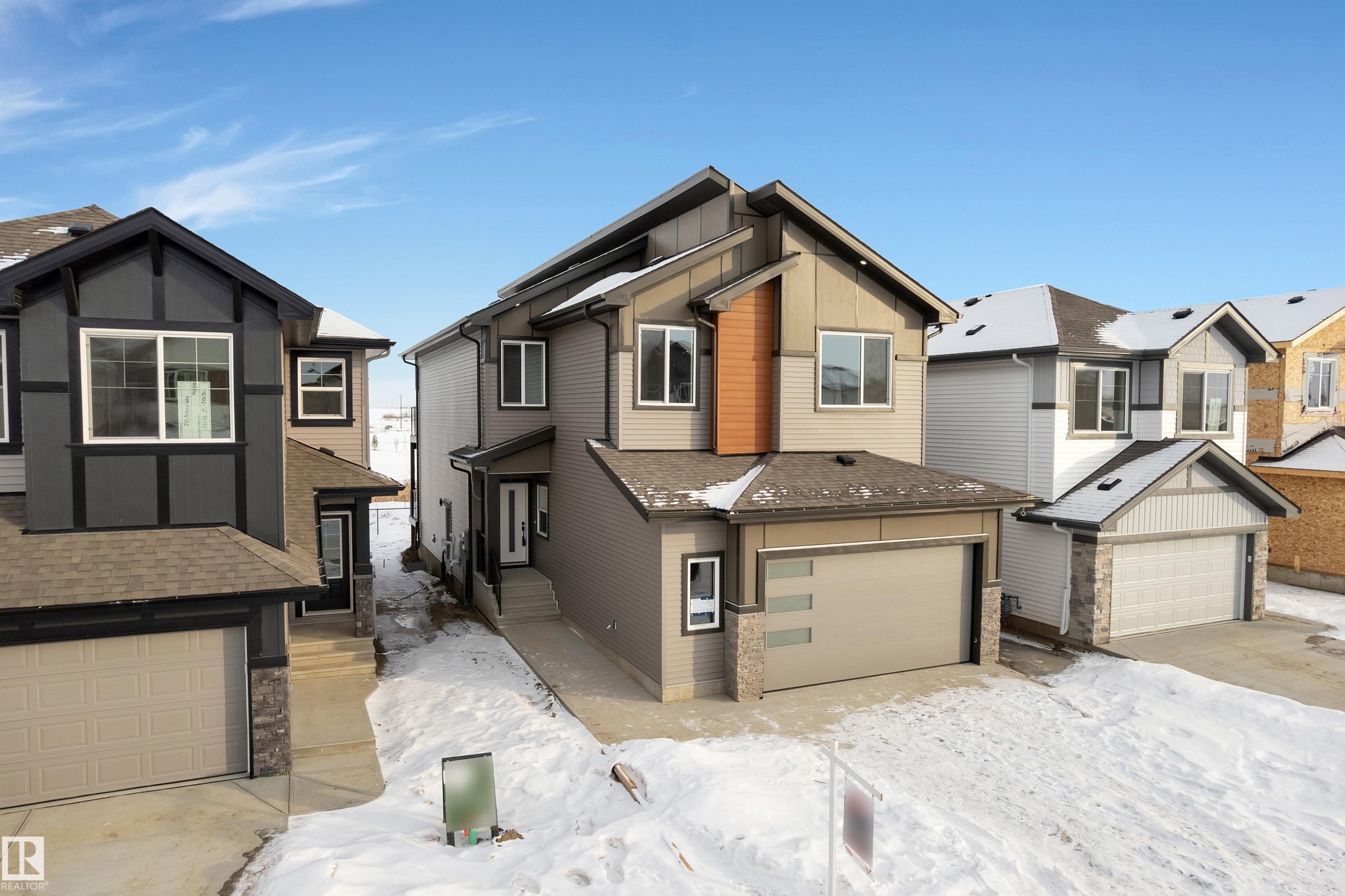 752 Astoria Way, Devon, AB - Outdoor With Facade