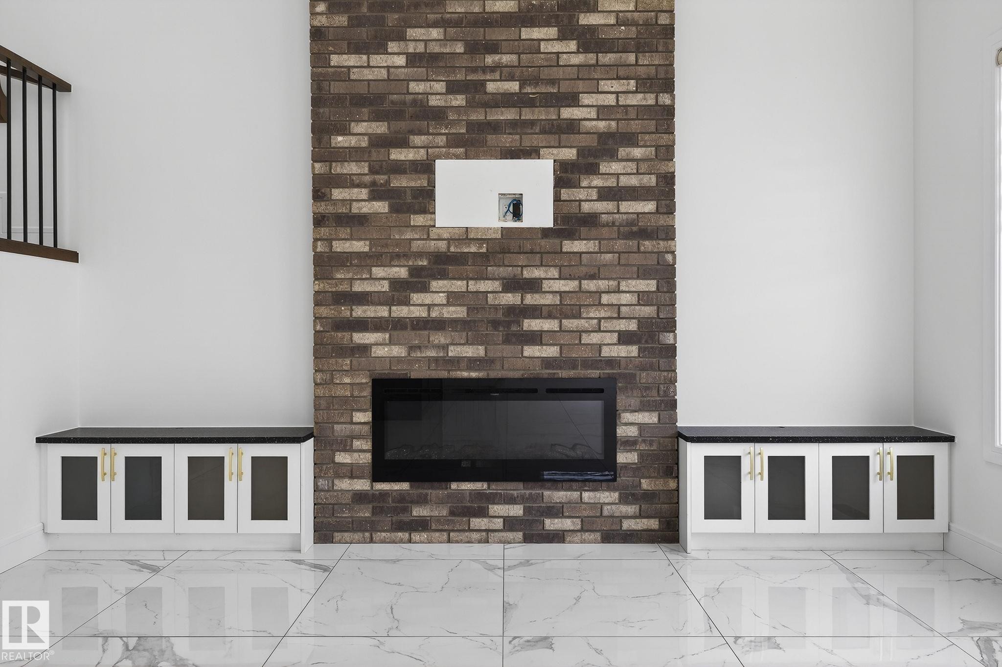 228 36 St Sw, Edmonton, AB - Indoor Photo Showing Other Room With Fireplace