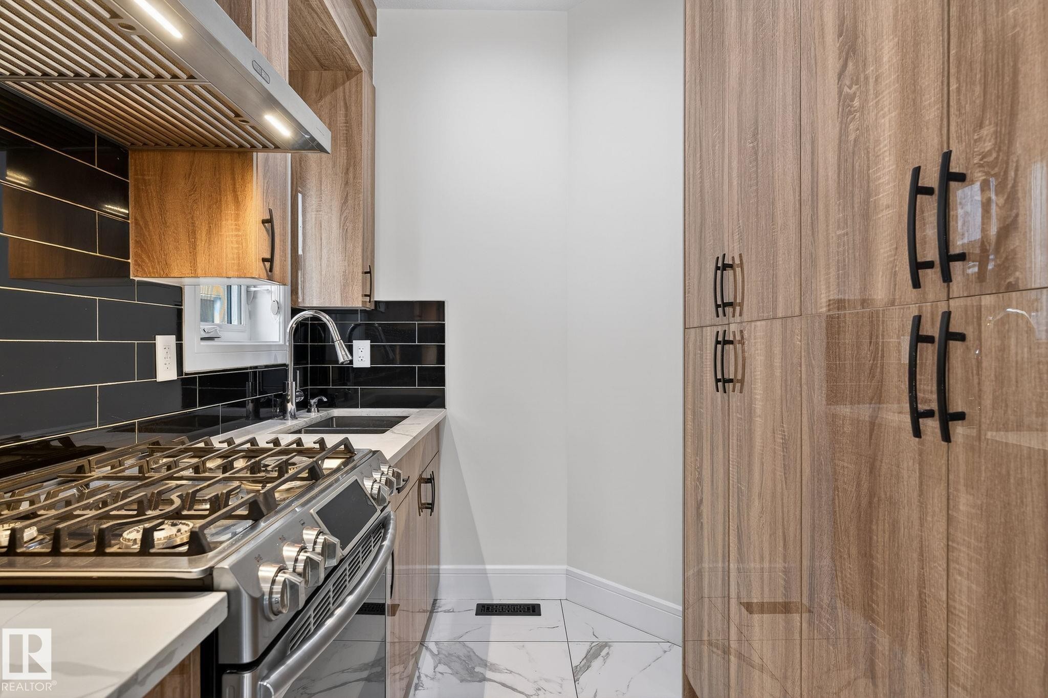 228 36 St Sw, Edmonton, AB - Indoor Photo Showing Kitchen With Double Sink