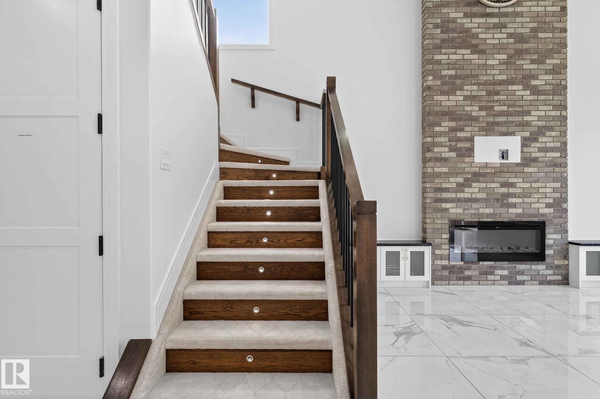 228 36 St Sw, Edmonton, AB - Indoor Photo Showing Other Room With Fireplace