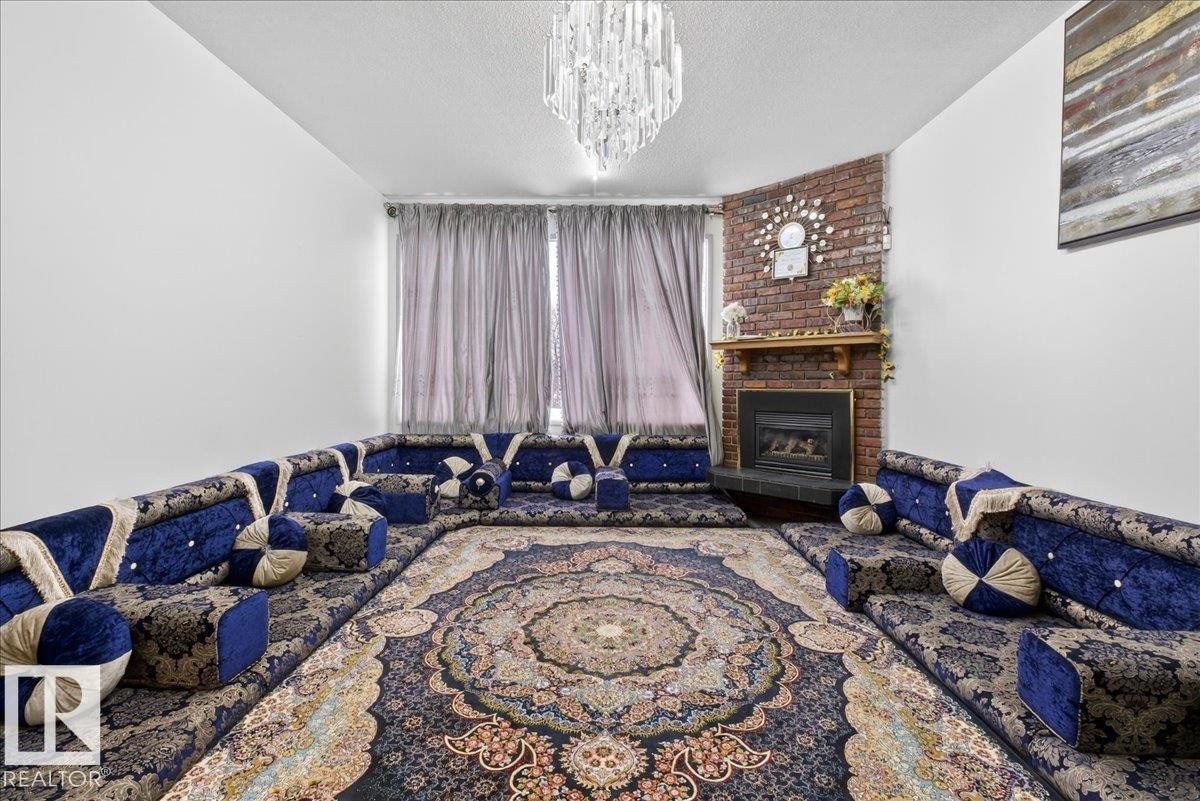 14920 95A Street, Edmonton, AB - Indoor Photo Showing Bedroom With Fireplace