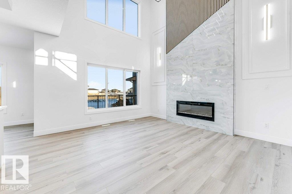 2408 63 Avenue, Rural Leduc County, AB - Indoor Photo Showing Living Room With Fireplace