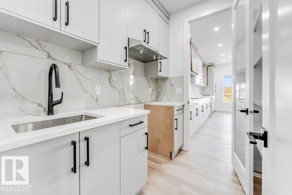 2408 63 Avenue, Rural Leduc County, AB - Indoor Photo Showing Kitchen With Upgraded Kitchen