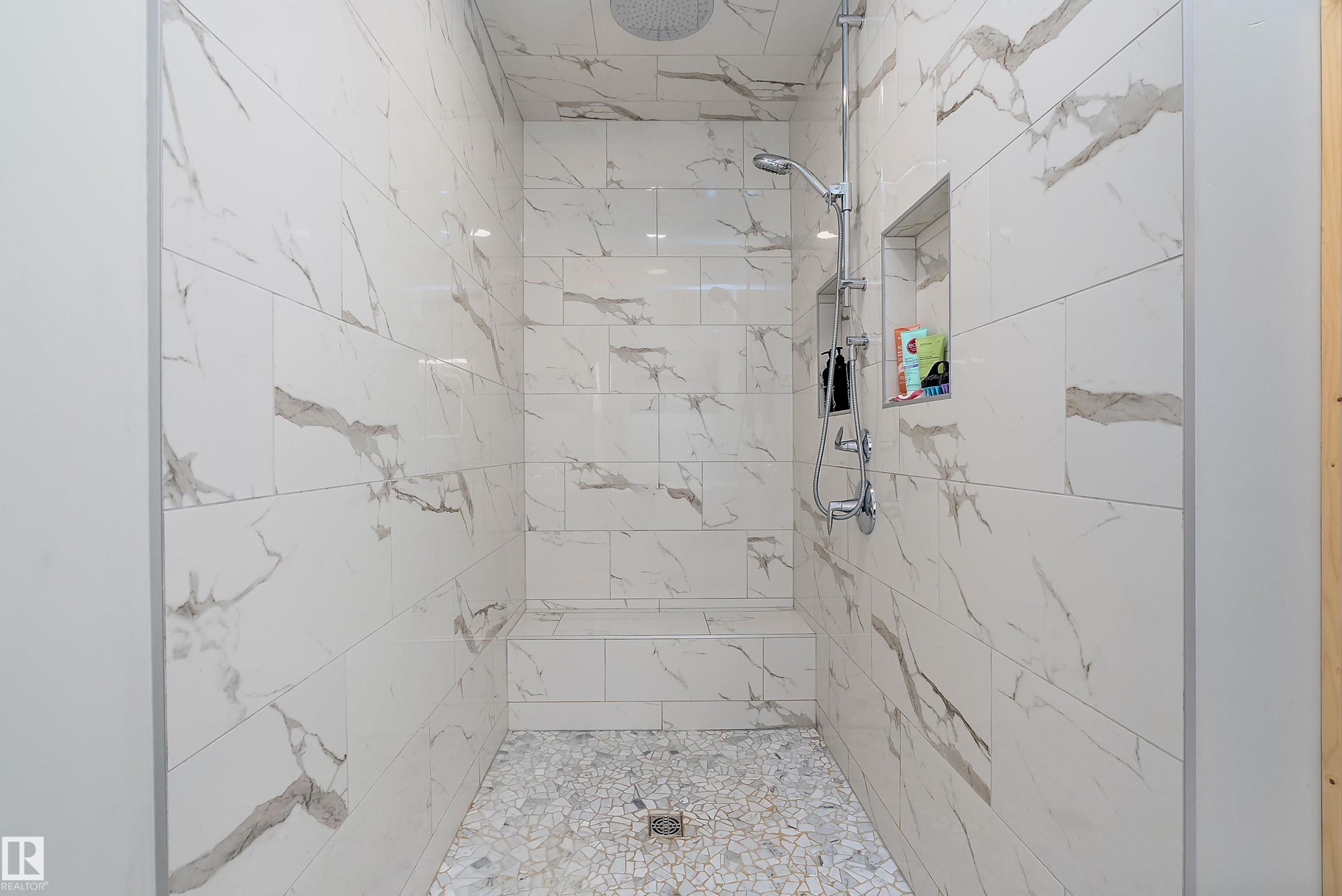 Full bath with a marble finish shower - 19003 Twp Rd 522, Rural Beaver County, AB - Indoor Photo Showing Bathroom