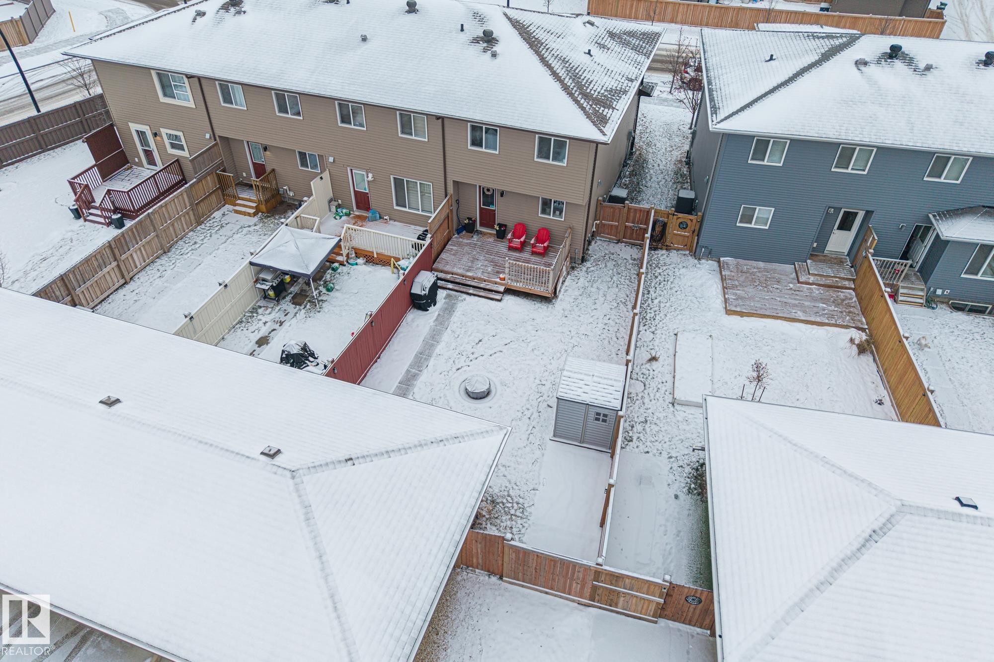 Snowy aerial view featuring a residential view - 20110 27 Avenue, Edmonton, AB - Outdoor With Deck Patio Veranda With Exterior