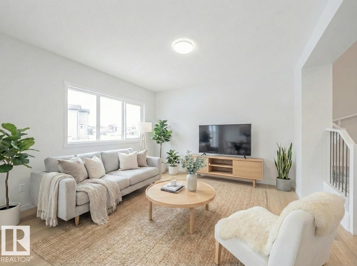 4631 Kinsella Landing, Edmonton, AB - Indoor Photo Showing Living Room