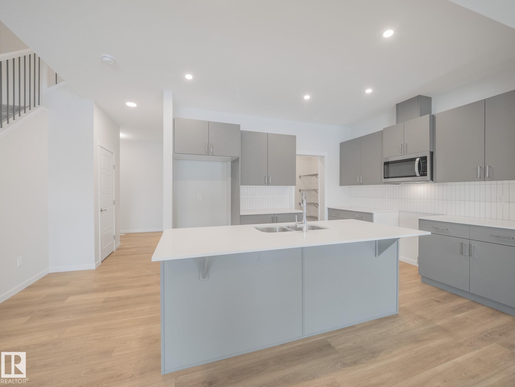 4631 Kinsella Landing, Edmonton, AB - Indoor Photo Showing Kitchen With Double Sink With Upgraded Kitchen