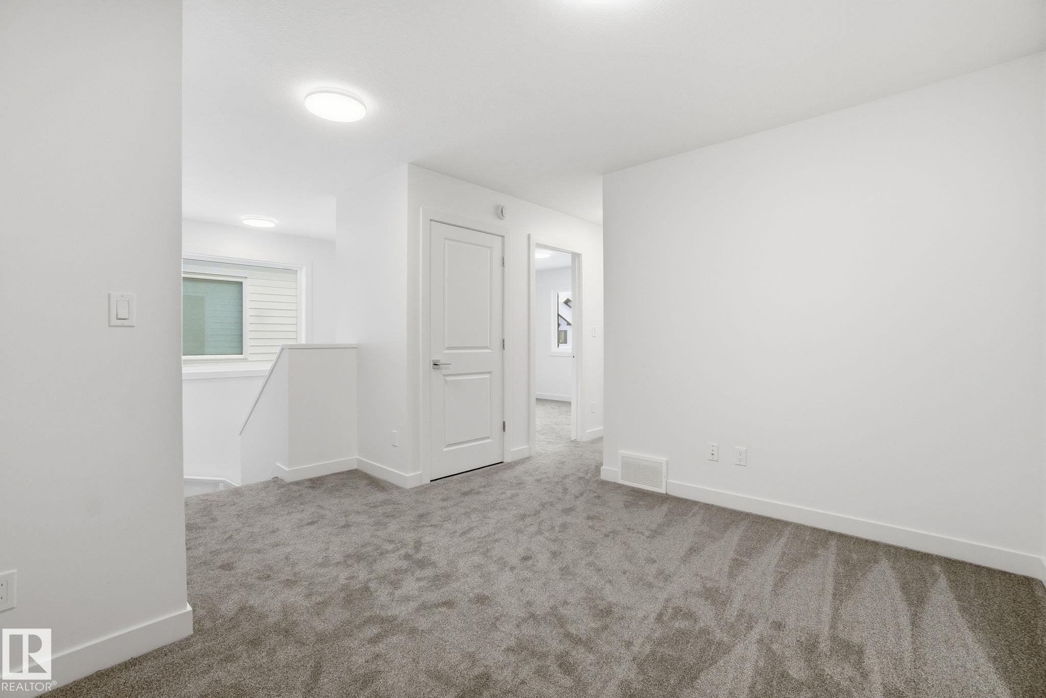 19 5122 213A Street, Edmonton, AB - Indoor Photo Showing Other Room