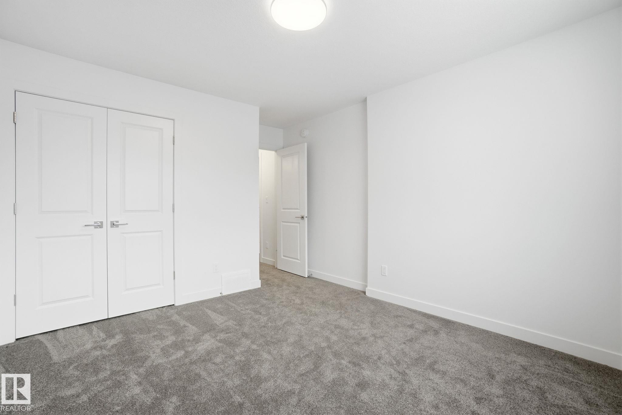 19 5122 213A Street, Edmonton, AB - Indoor Photo Showing Other Room