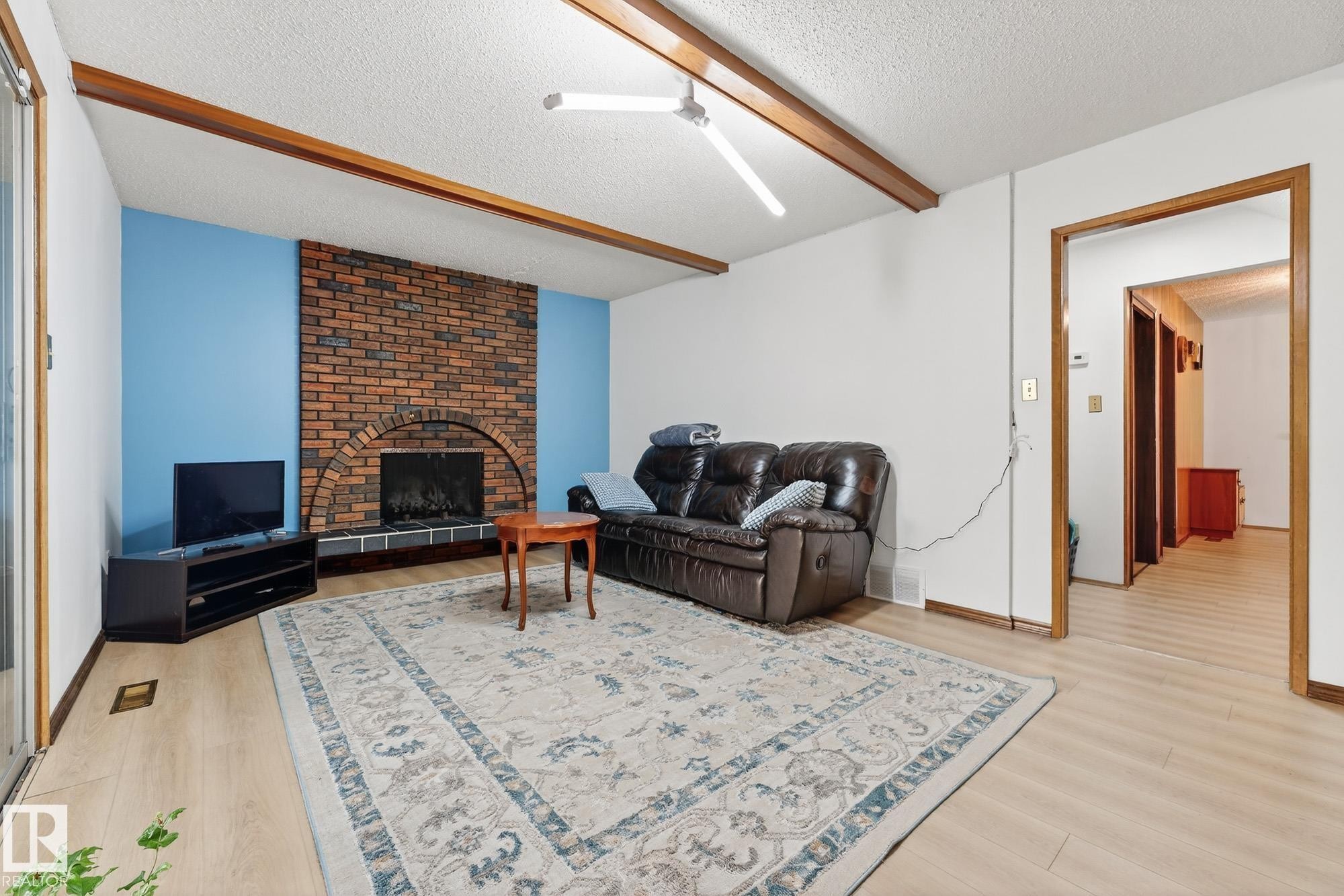 3310 113A Street, Edmonton, AB - Indoor Photo Showing Living Room With Fireplace