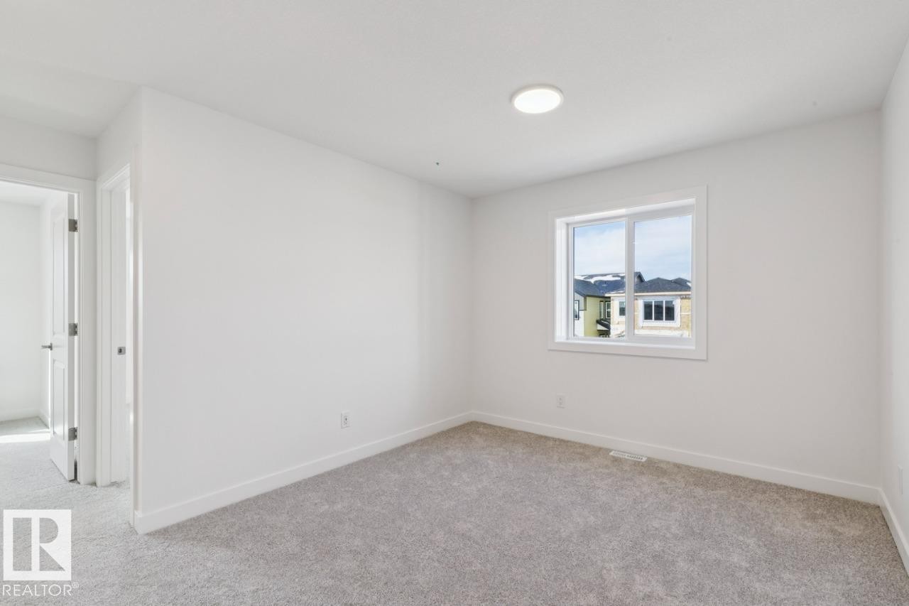 245 Wattle Road, Leduc, AB - Indoor Photo Showing Other Room