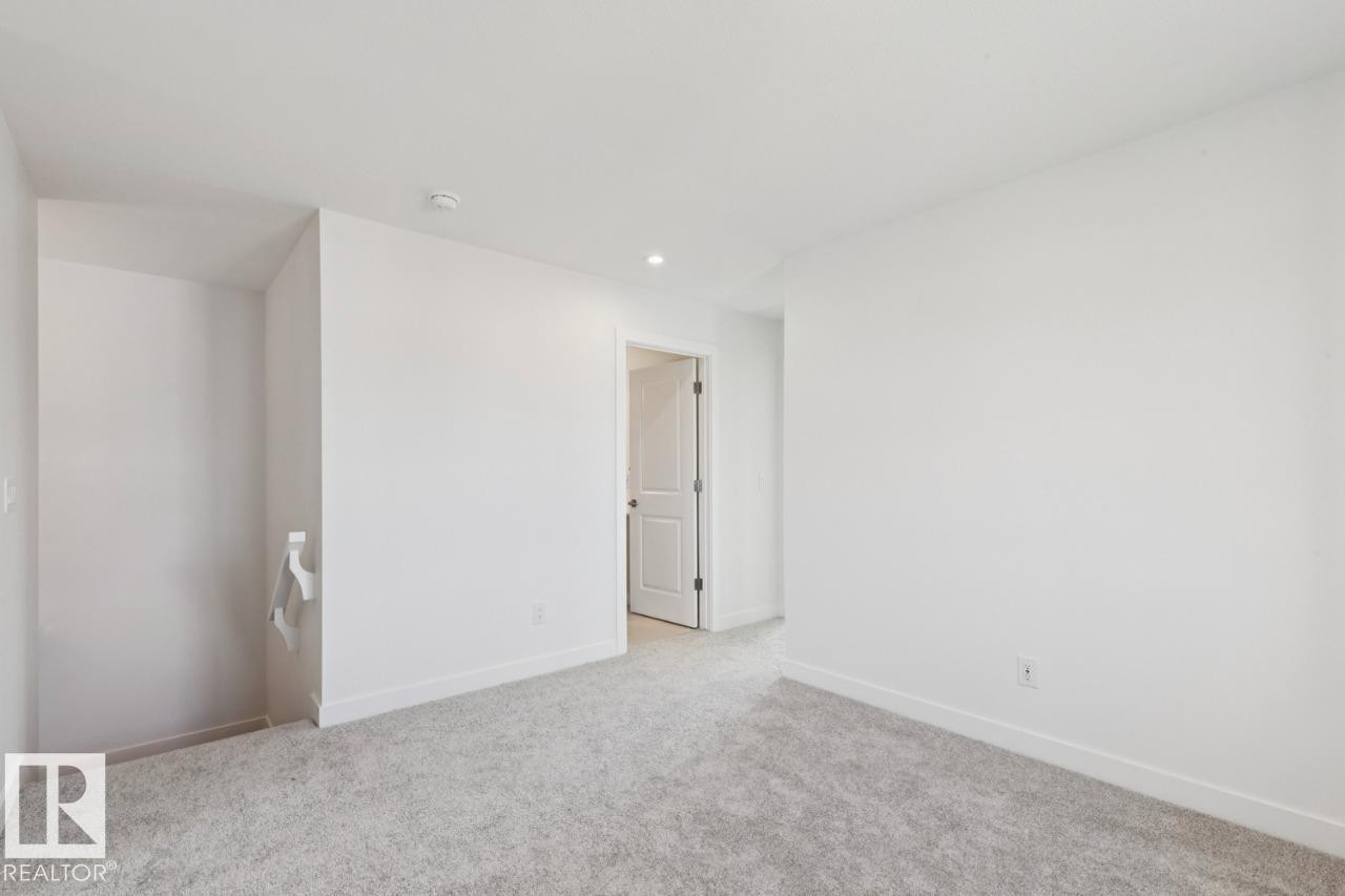 245 Wattle Road, Leduc, AB - Indoor Photo Showing Other Room
