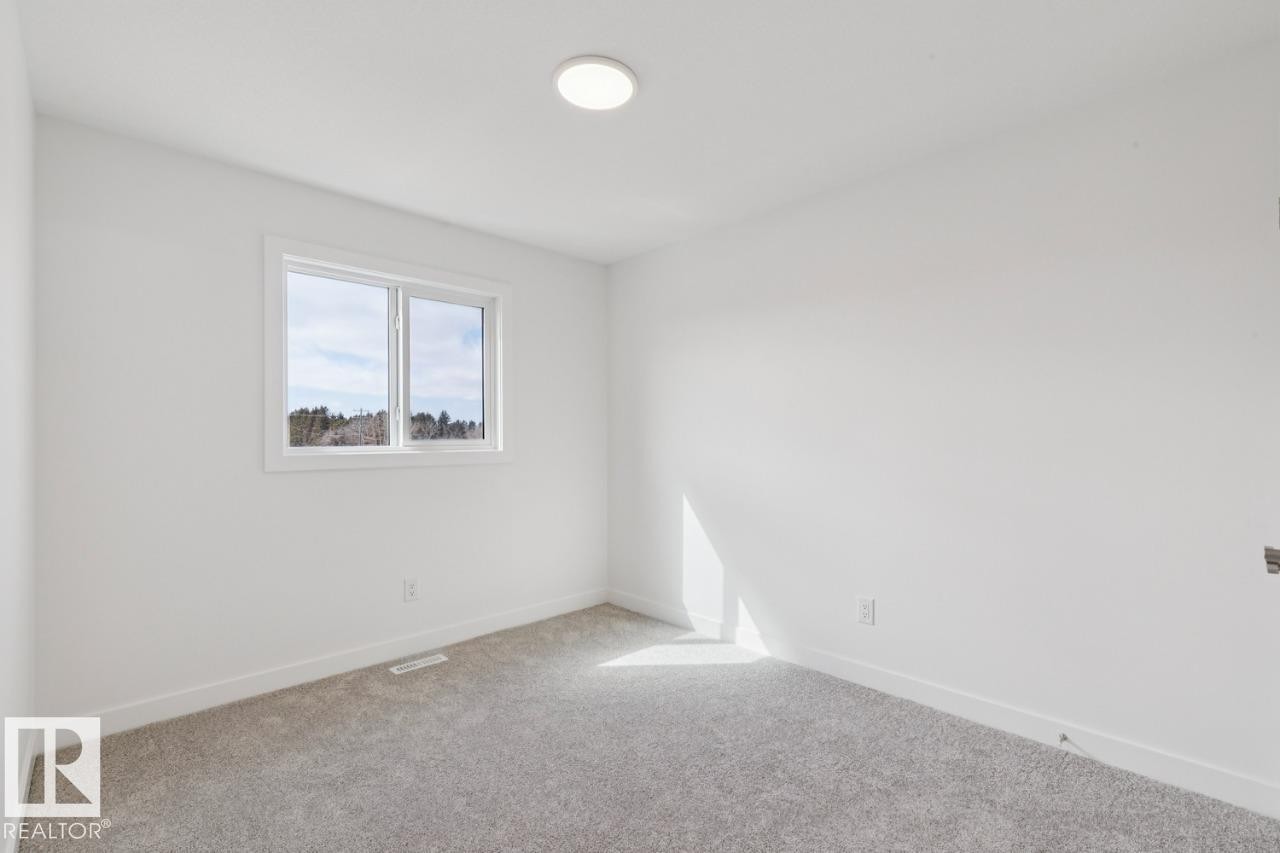 245 Wattle Road, Leduc, AB - Indoor Photo Showing Other Room