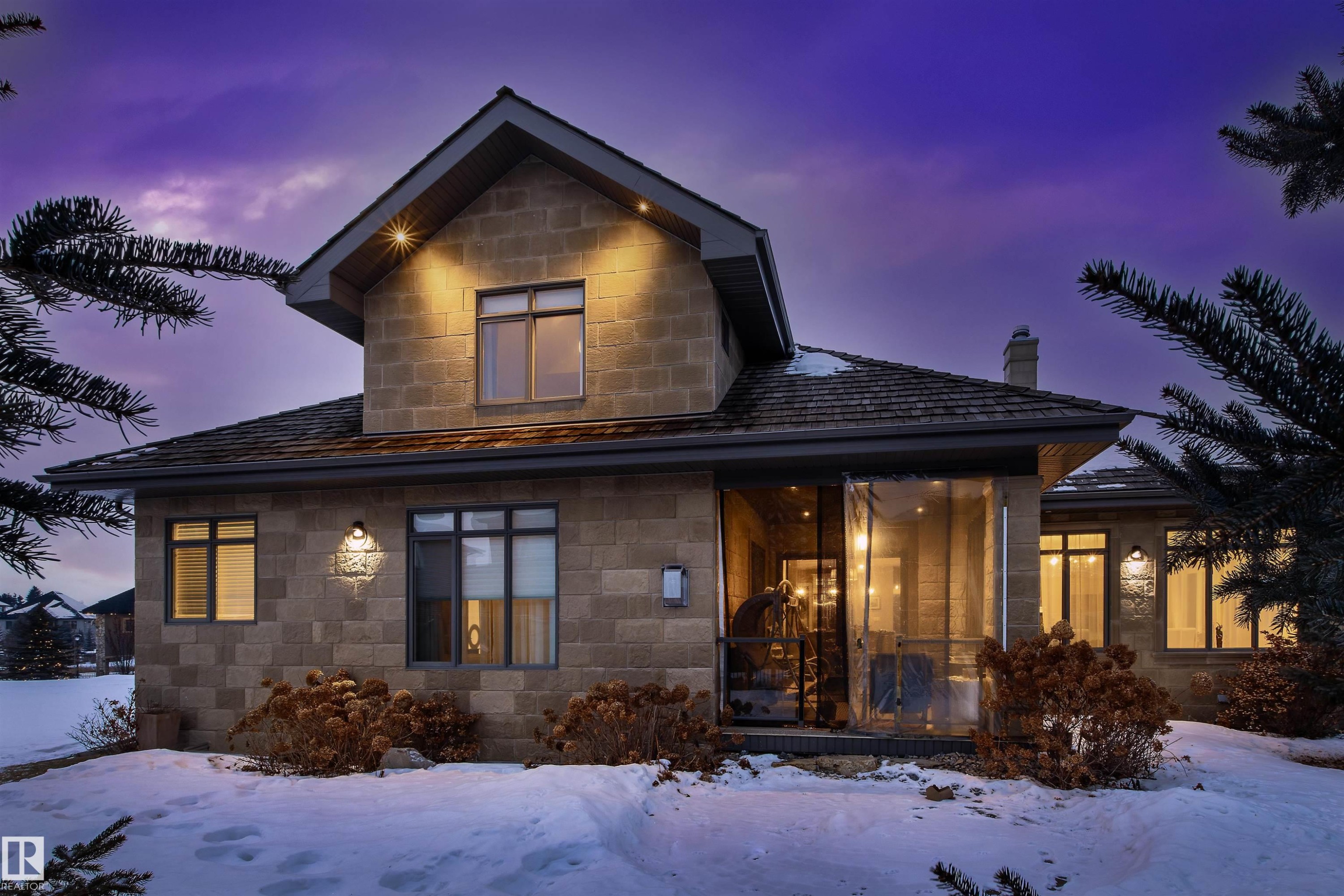 View of front of home featuring a chimney and stone siding - 2796 Wheaton Drive, Edmonton, AB - Outdoor