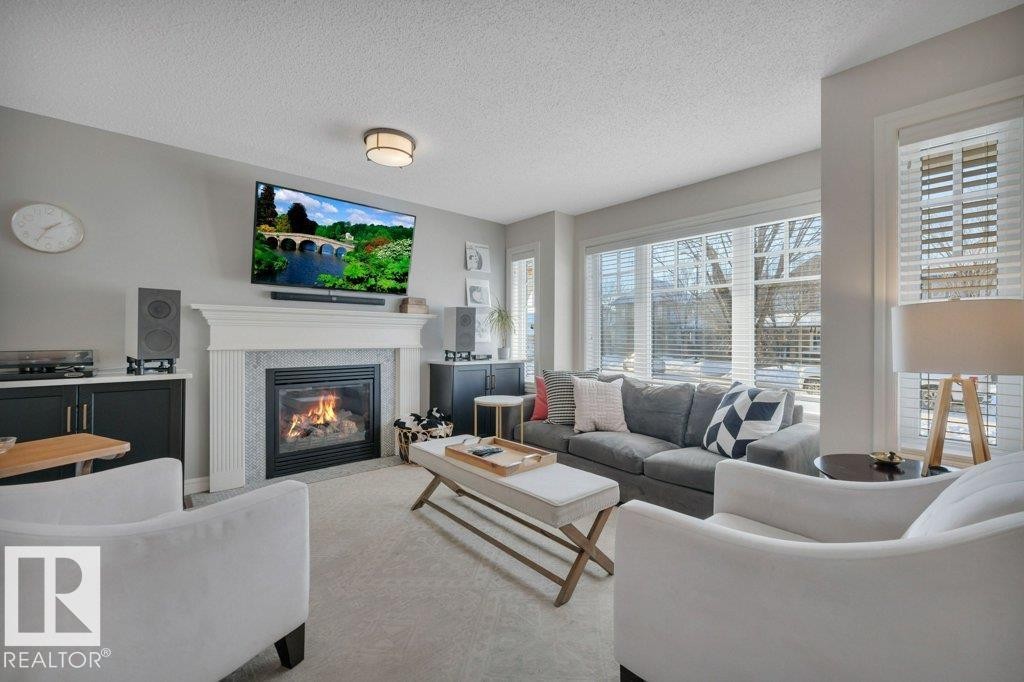 2464 Austin Crescent, Edmonton, AB - Indoor Photo Showing Living Room With Fireplace