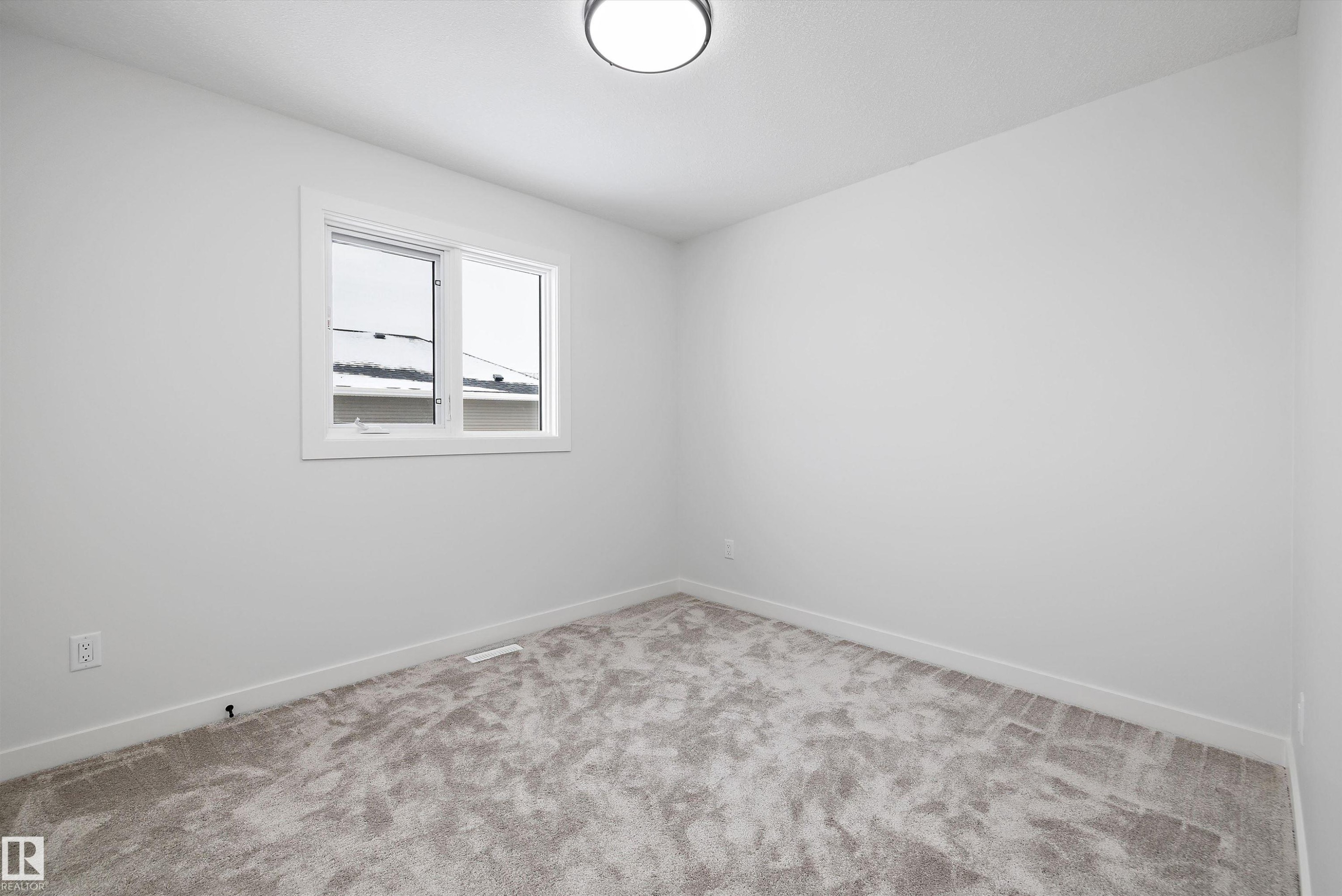Spare room with baseboards and carpet floors - 230 Edgemont Green Green Nw, Edmonton, AB - Indoor Photo Showing Other Room