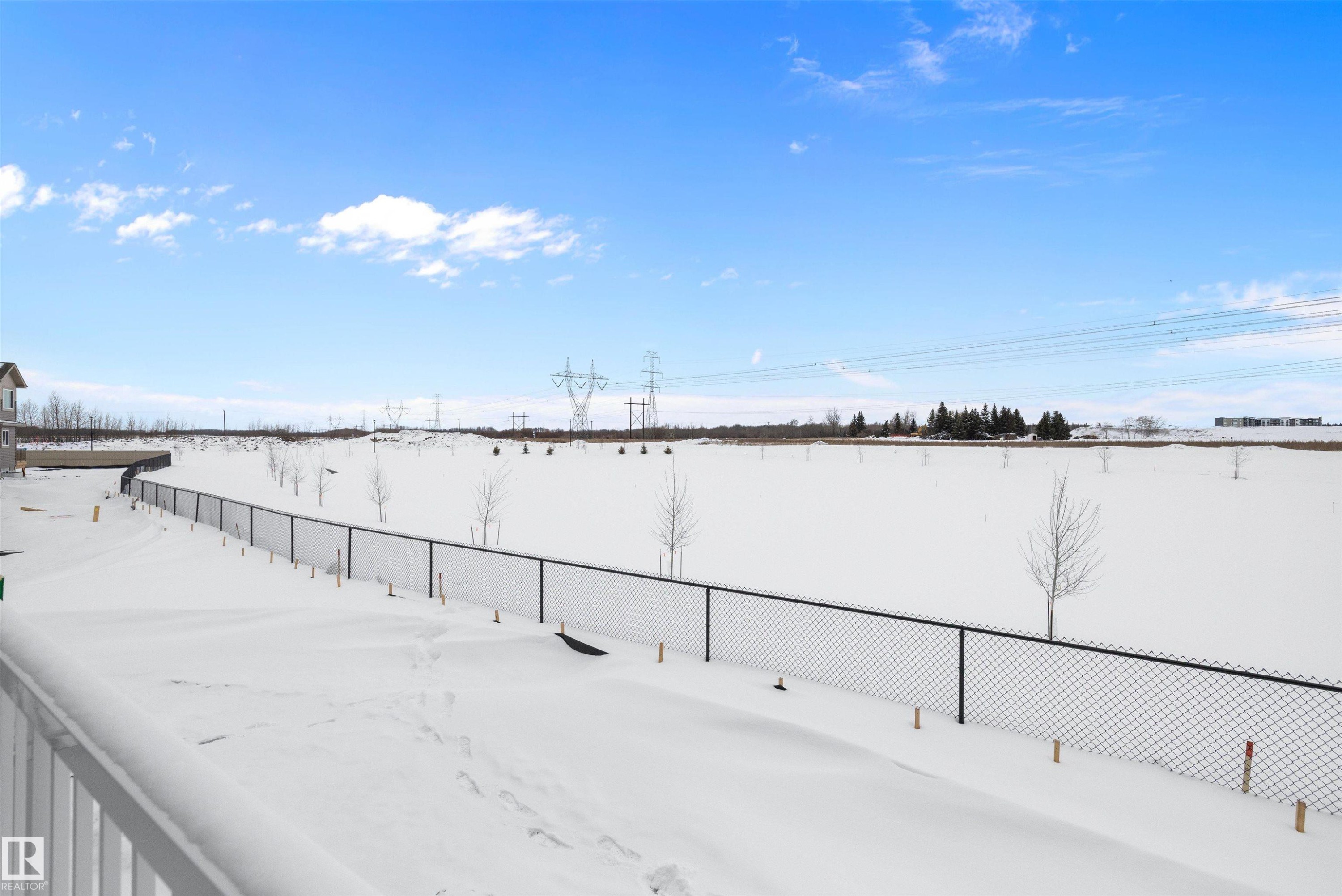 View of yard covered in snow - 230 Edgemont Green Green Nw, Edmonton, AB - Outdoor With View