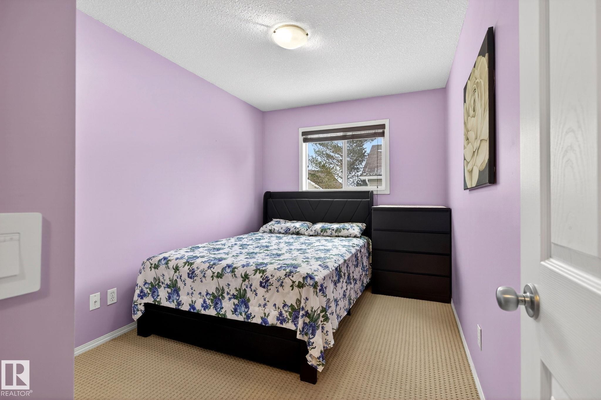 108 150 Edwards Drive, Edmonton, AB - Indoor Photo Showing Bedroom