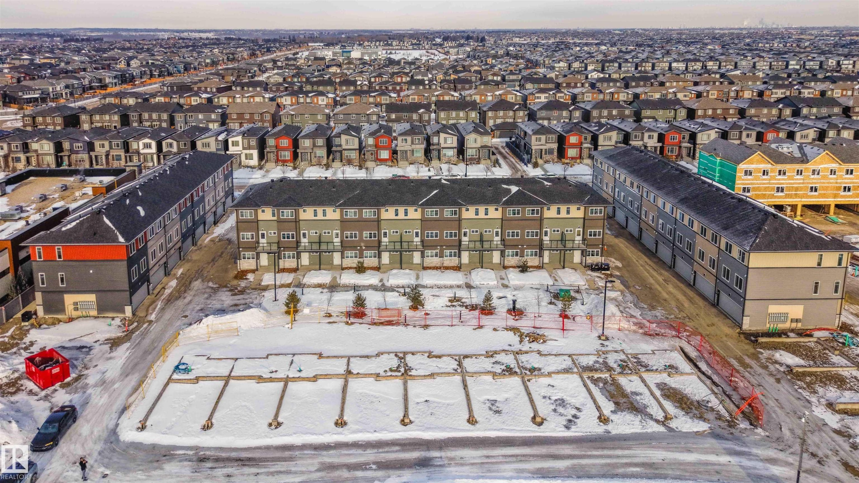 View of snowy aerial view - 64 18120 28 Avenue Sw, Edmonton, AB - Outdoor With View