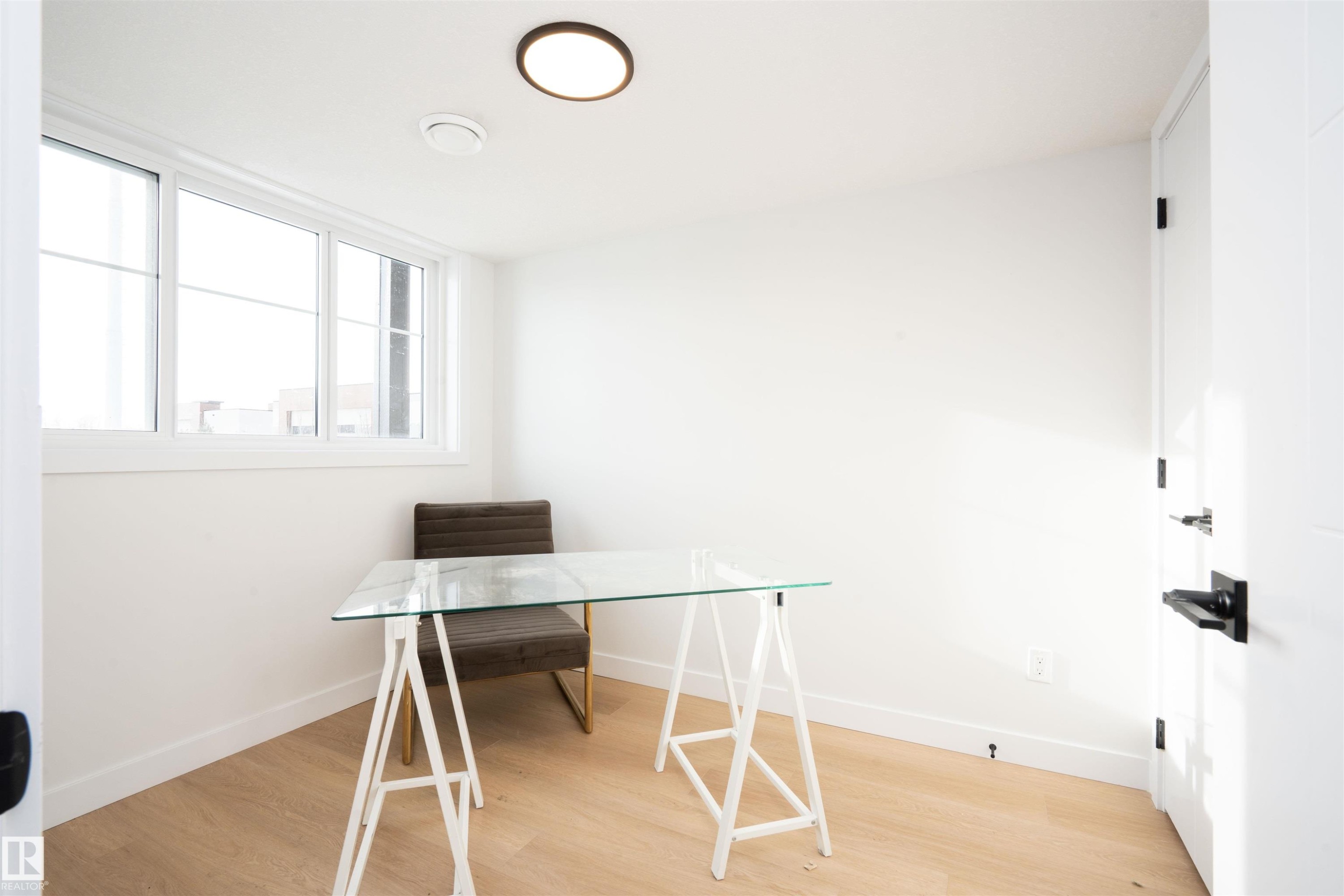 Office space with light wood finished floors - 64 18120 28 Avenue Sw, Edmonton, AB - Indoor