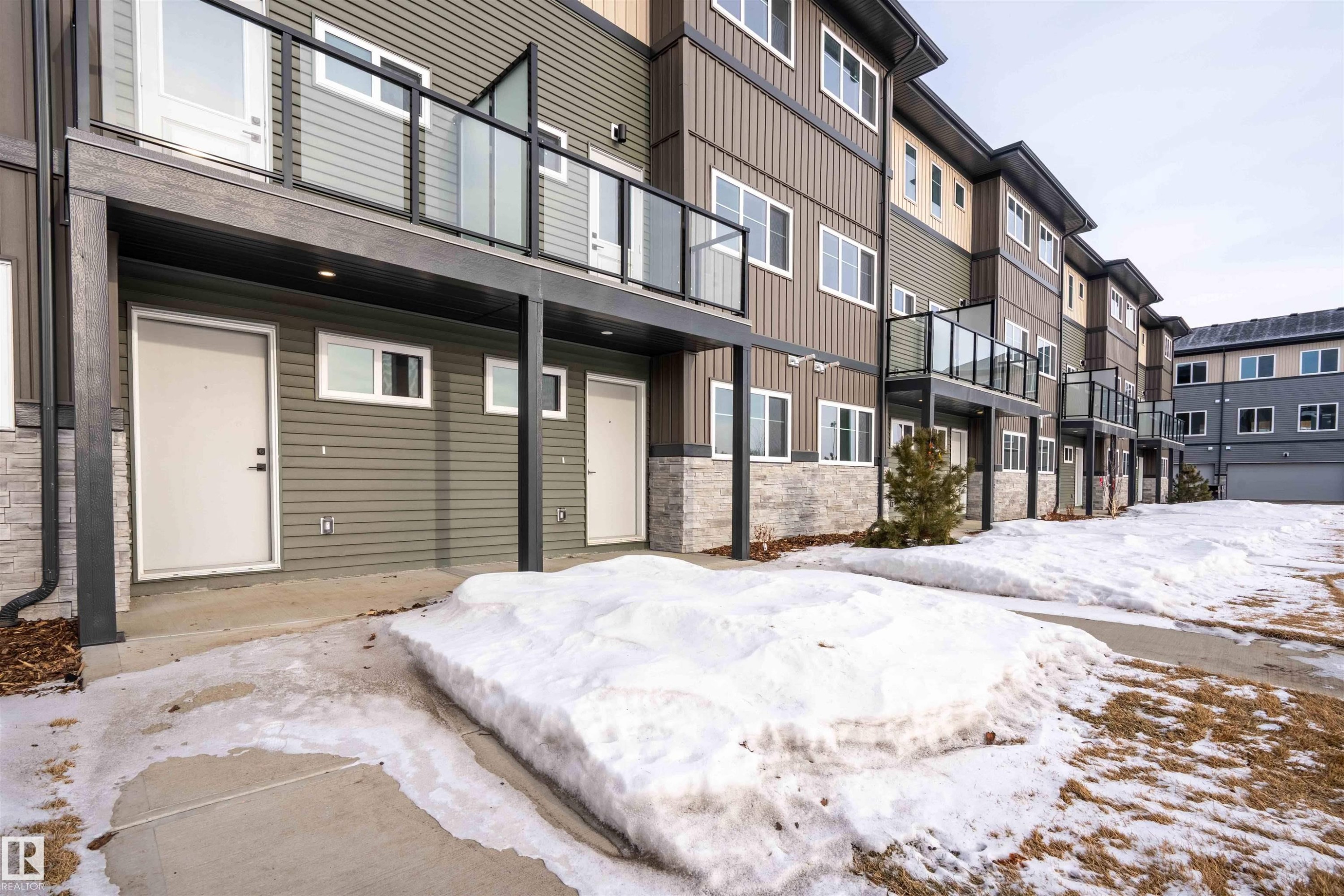 Snow covered property - 64 18120 28 Avenue Sw, Edmonton, AB - Outdoor