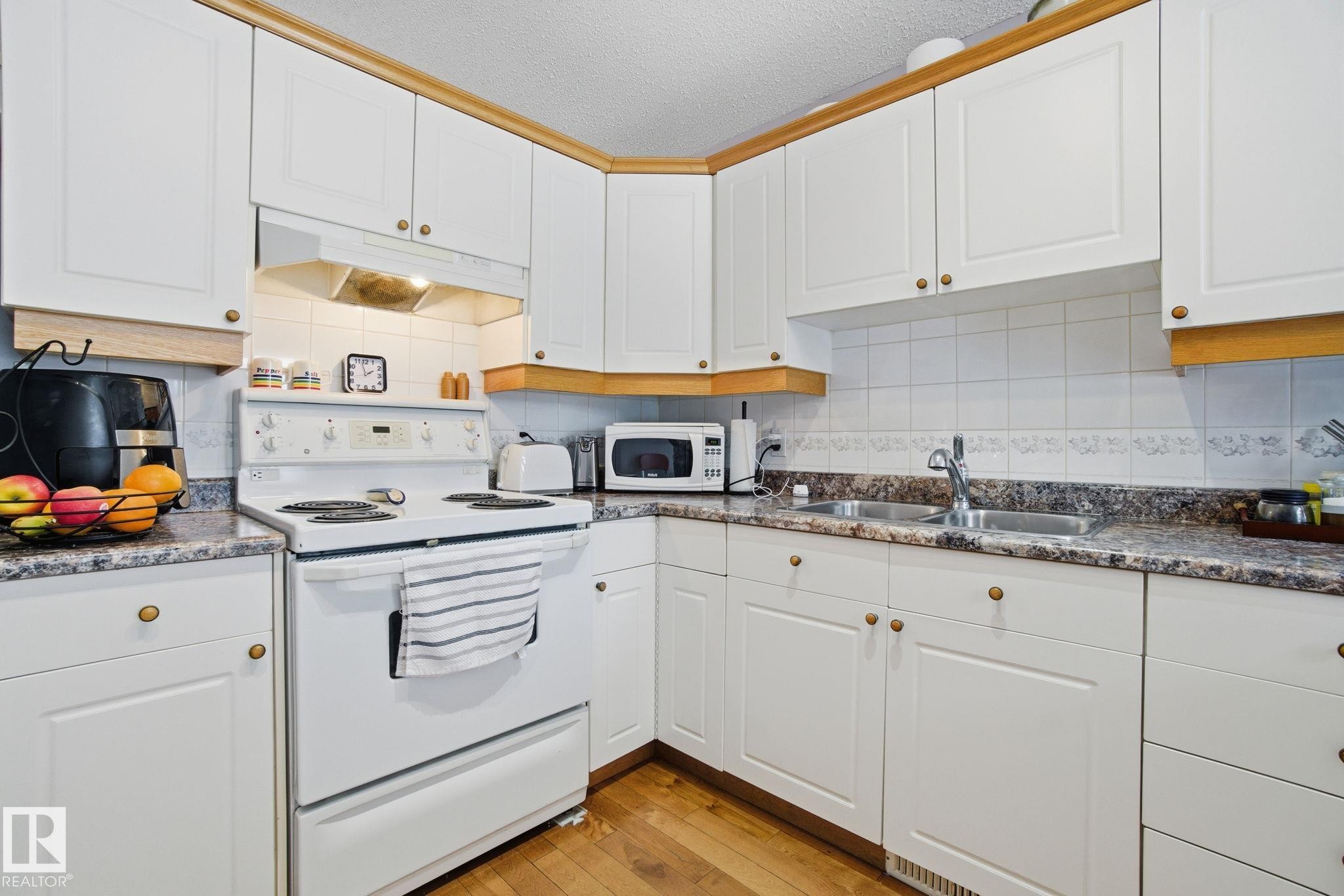8 9731 174 Street, Edmonton, AB - Indoor Photo Showing Kitchen With Double Sink