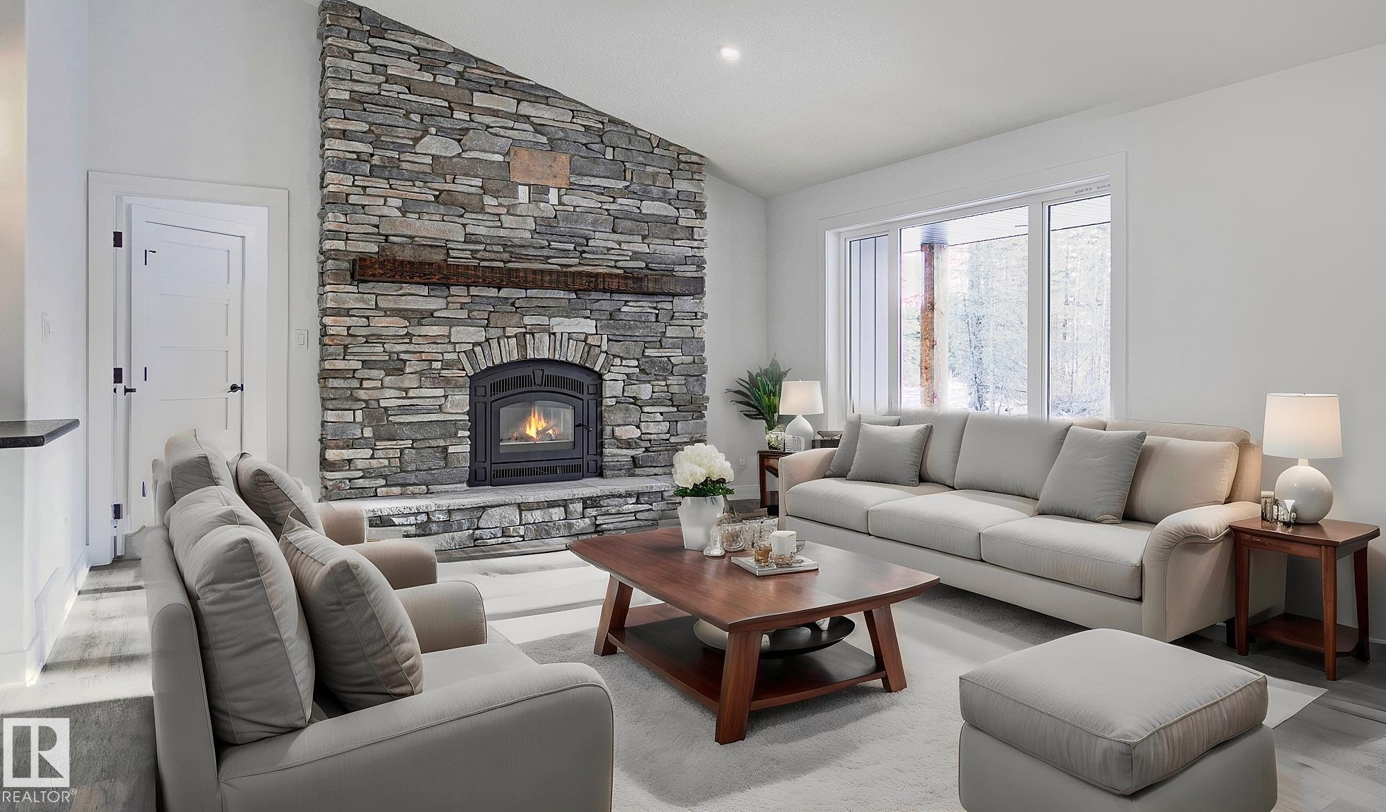 311 55504 Rr 13, Rural Lac Ste. Anne County, AB - Indoor Photo Showing Living Room With Fireplace