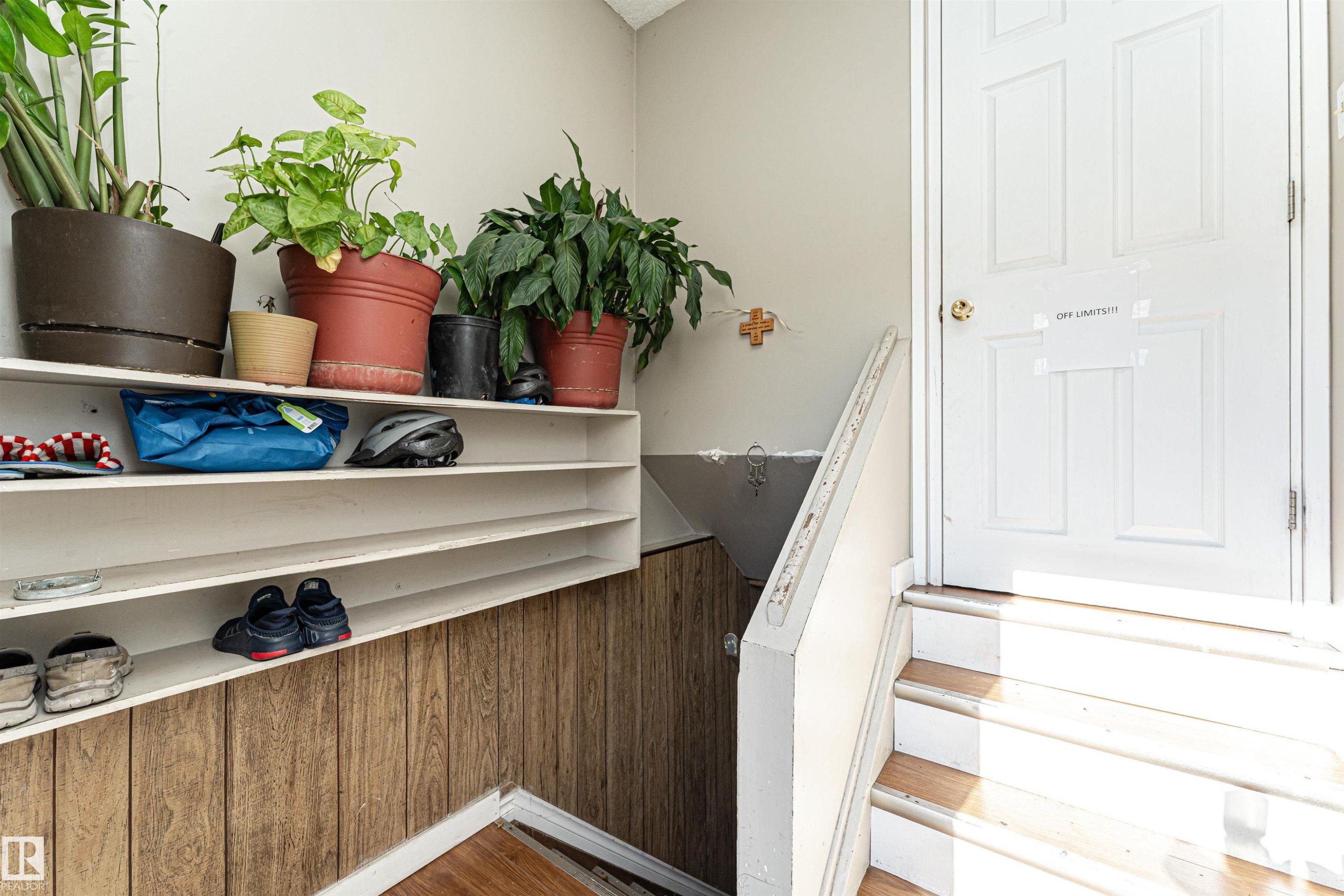 Staircase featuring wood finished floors - 2349 Millbourne Road W, Edmonton, AB - Indoor Photo Showing Other Room