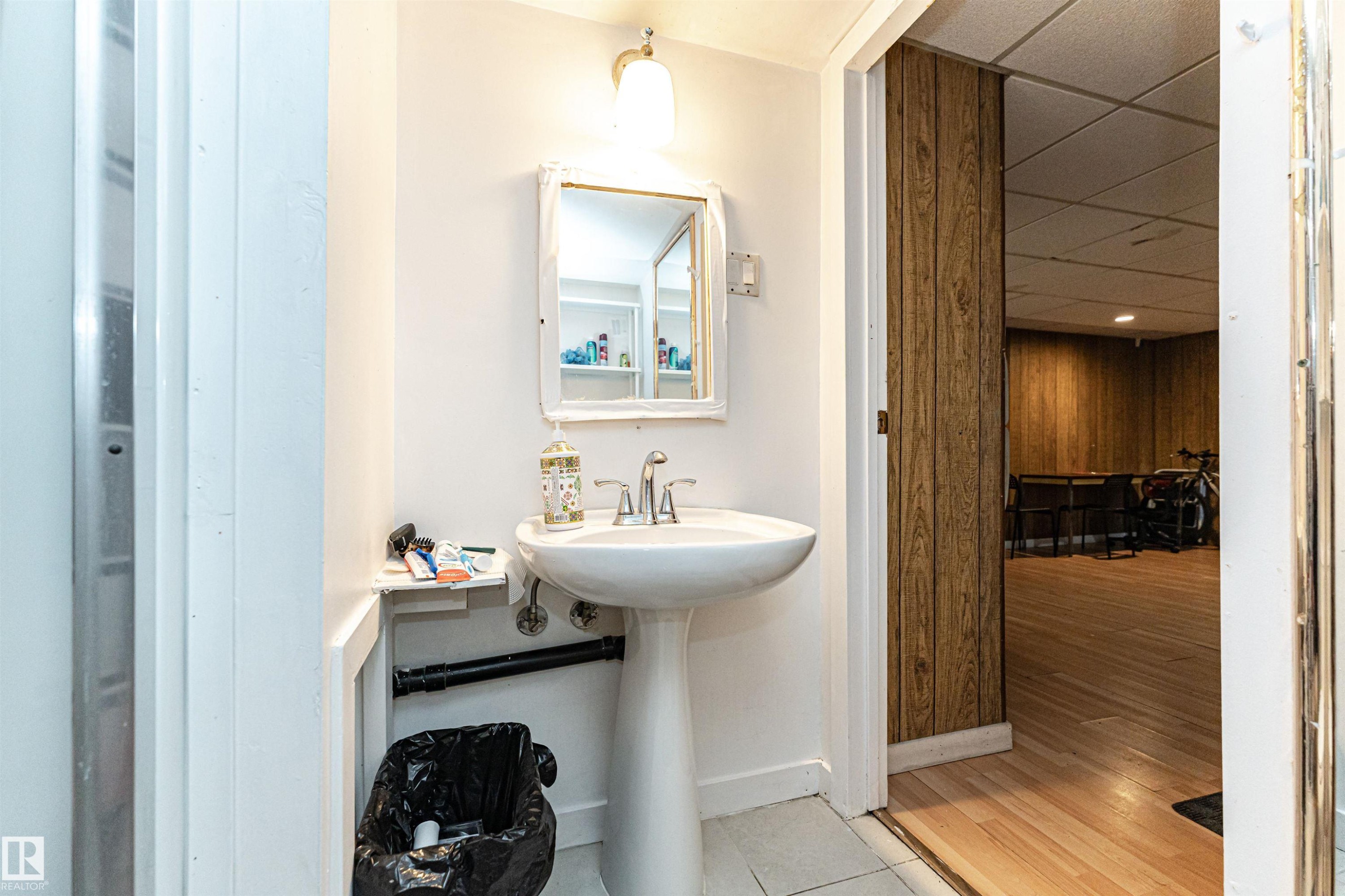 Bathroom featuring a paneled ceiling and baseboards - 2349 Millbourne Road W, Edmonton, AB - Indoor Photo Showing Bathroom