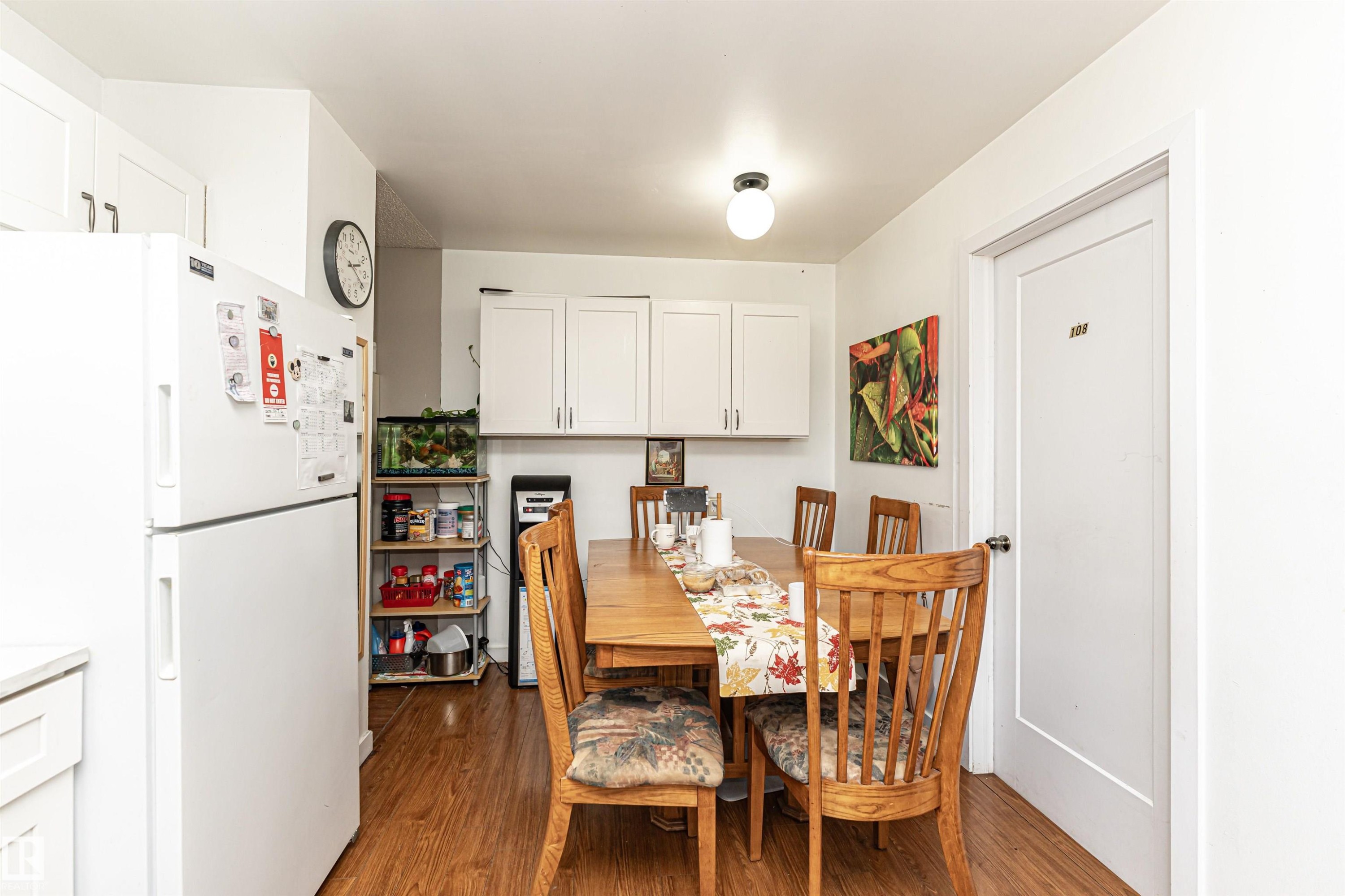 Dining space featuring dark wood-type flooring - 2349 Millbourne Road W, Edmonton, AB - Indoor Photo Showing Dining Room