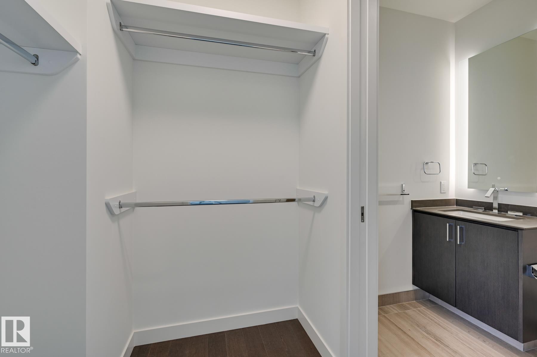 Bathroom with vanity and light wood-type flooring - 2303 10360 102 Street, Edmonton, AB - Indoor With Storage