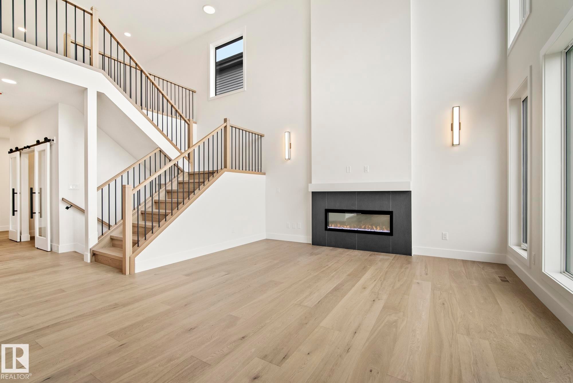 7095 Kiviaq Crescent, Edmonton, AB - Indoor Photo Showing Living Room With Fireplace
