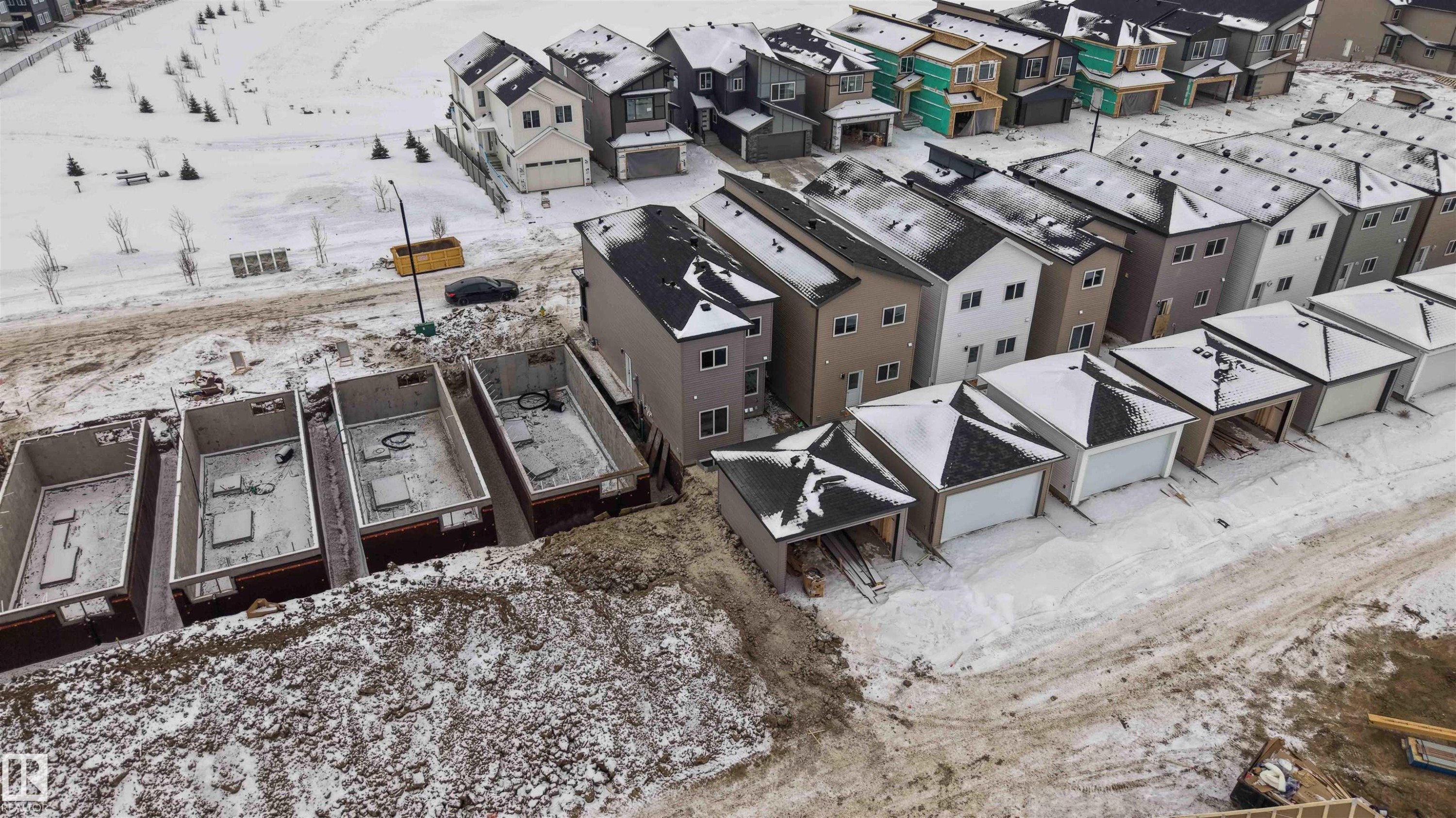 Snowy aerial view featuring a residential view - 430 Crystal Creek Link, Leduc, AB - Outdoor