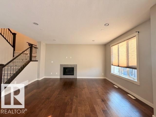 5025 53 Avenue, Calmar, AB - Indoor With Fireplace