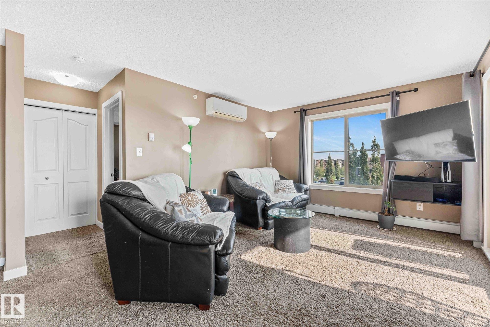 402 11803 22 Avenue, Edmonton, AB - Indoor Photo Showing Living Room