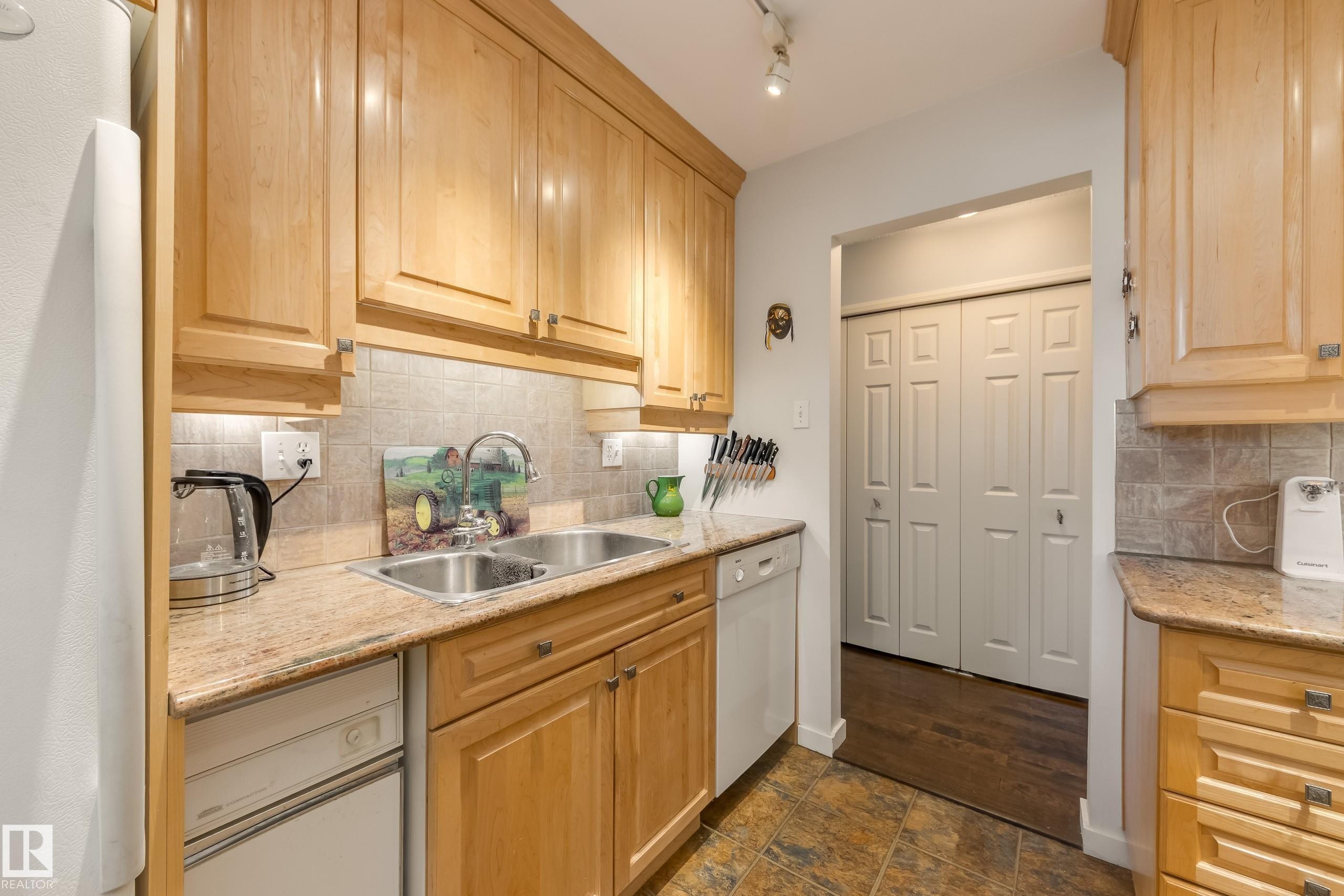 108 14810 51 Avenue, Edmonton, AB - Indoor Photo Showing Kitchen With Double Sink
