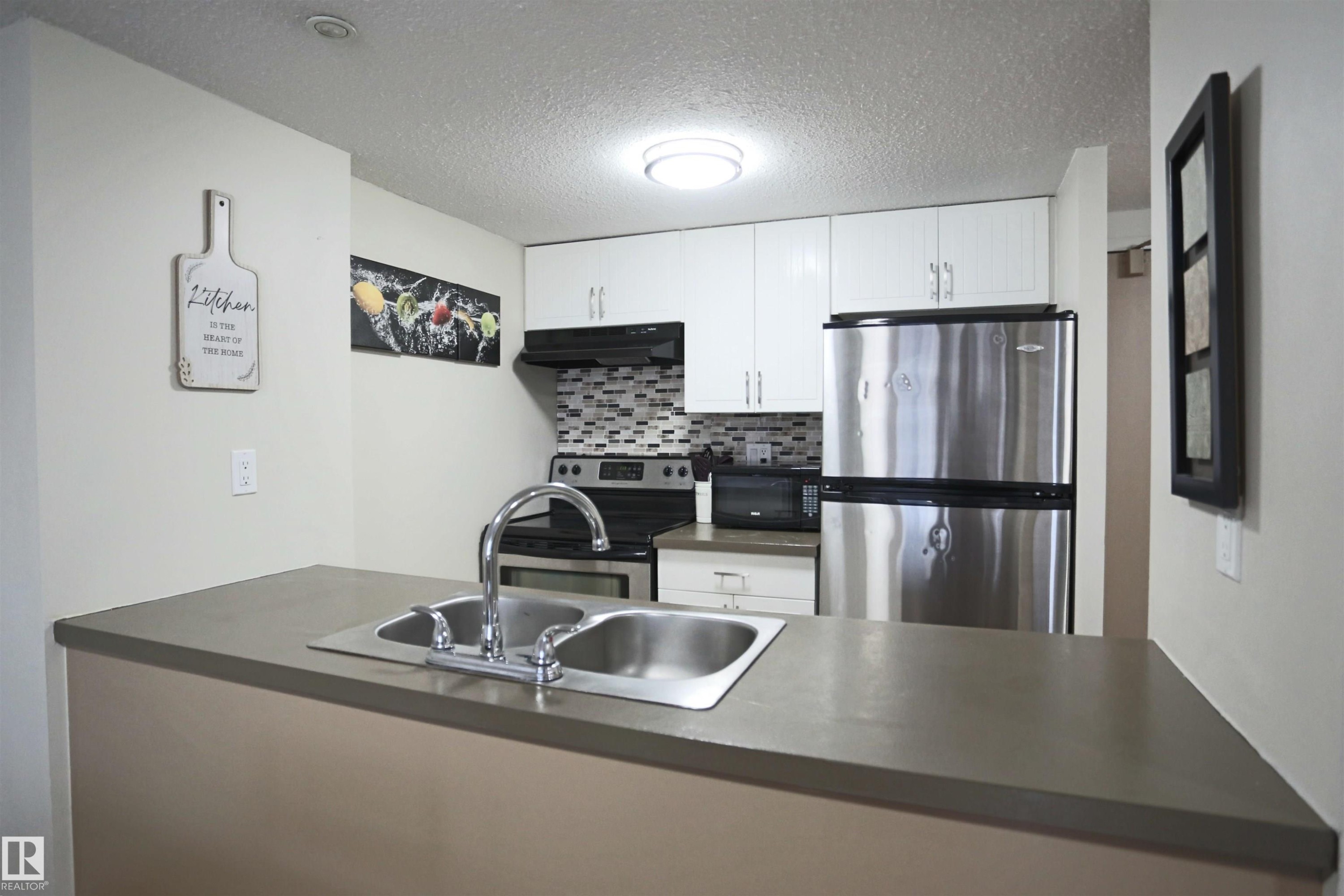 804 10160 114 Street, Edmonton, AB - Indoor Photo Showing Kitchen With Double Sink