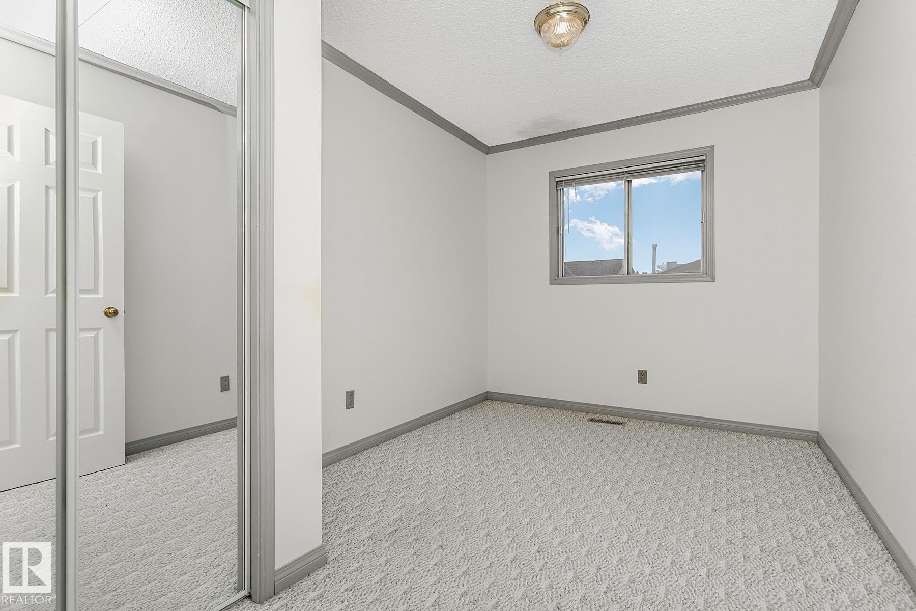 Edmonton, AB - Indoor Photo Showing Other Room